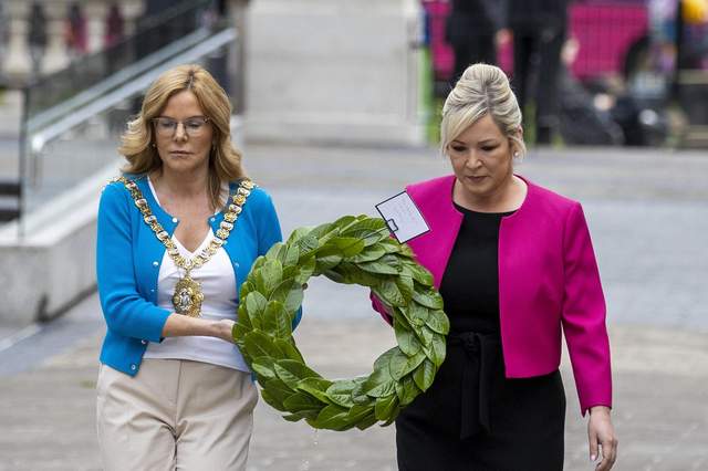 GESTURE: Michelle O’Neill and Belfast Lord Mayor Tina black lay a wreath at the Cenotaph