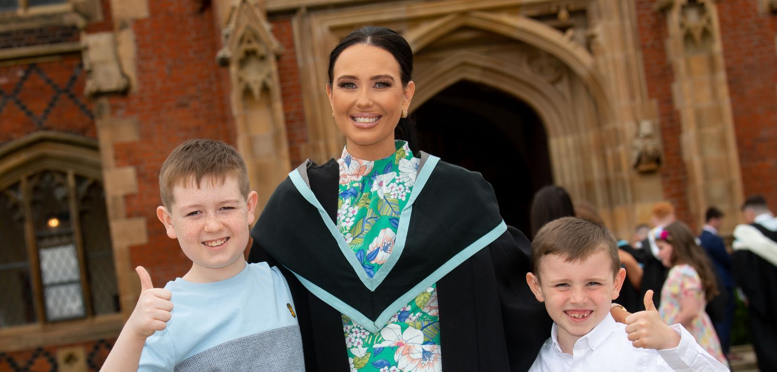 TOP OF THE CLASS: Natasha celebrating graduating with a first class honours degree in Nursing with her sons Corey (13) and Daniel (6)