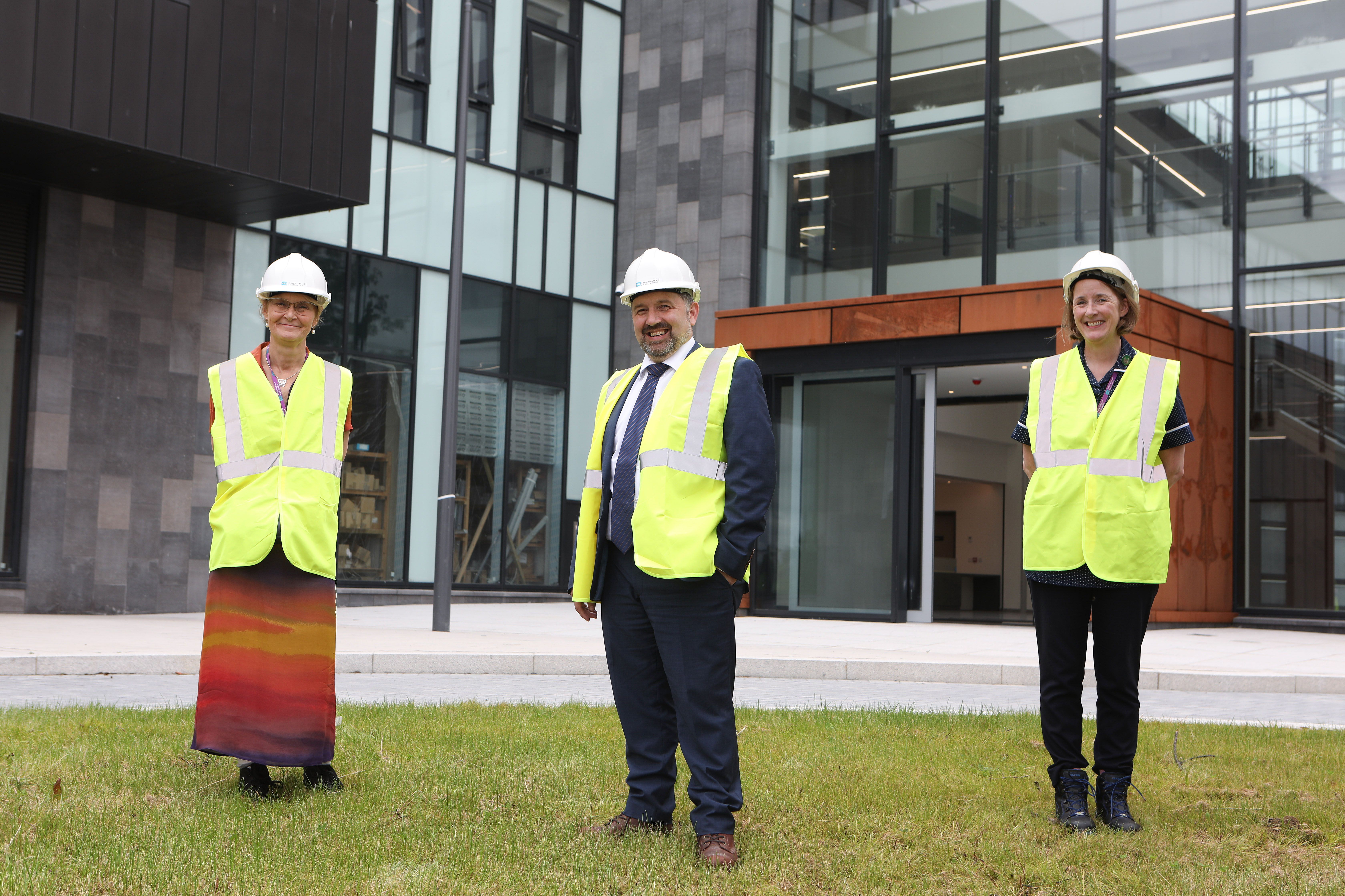 Pictured outside the new Maternity hospital with Health Minister Robin Swann are Dr Cathy Jack, Chief Executive, Belfast Health and Social Care Trust and Brenda Kelly, Head of Midwifery, Belfast Health and Social Care Trust.