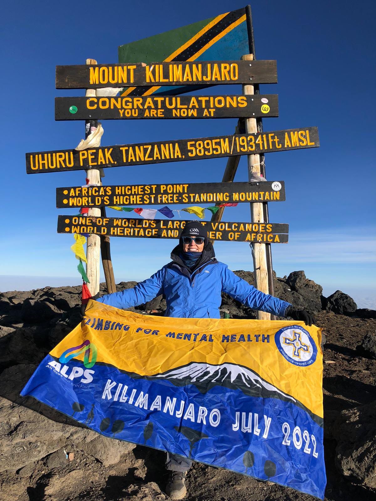 COMPLETED: Colette Deery of Edmund Rice College at the summit of Mount Kilimanjaro
