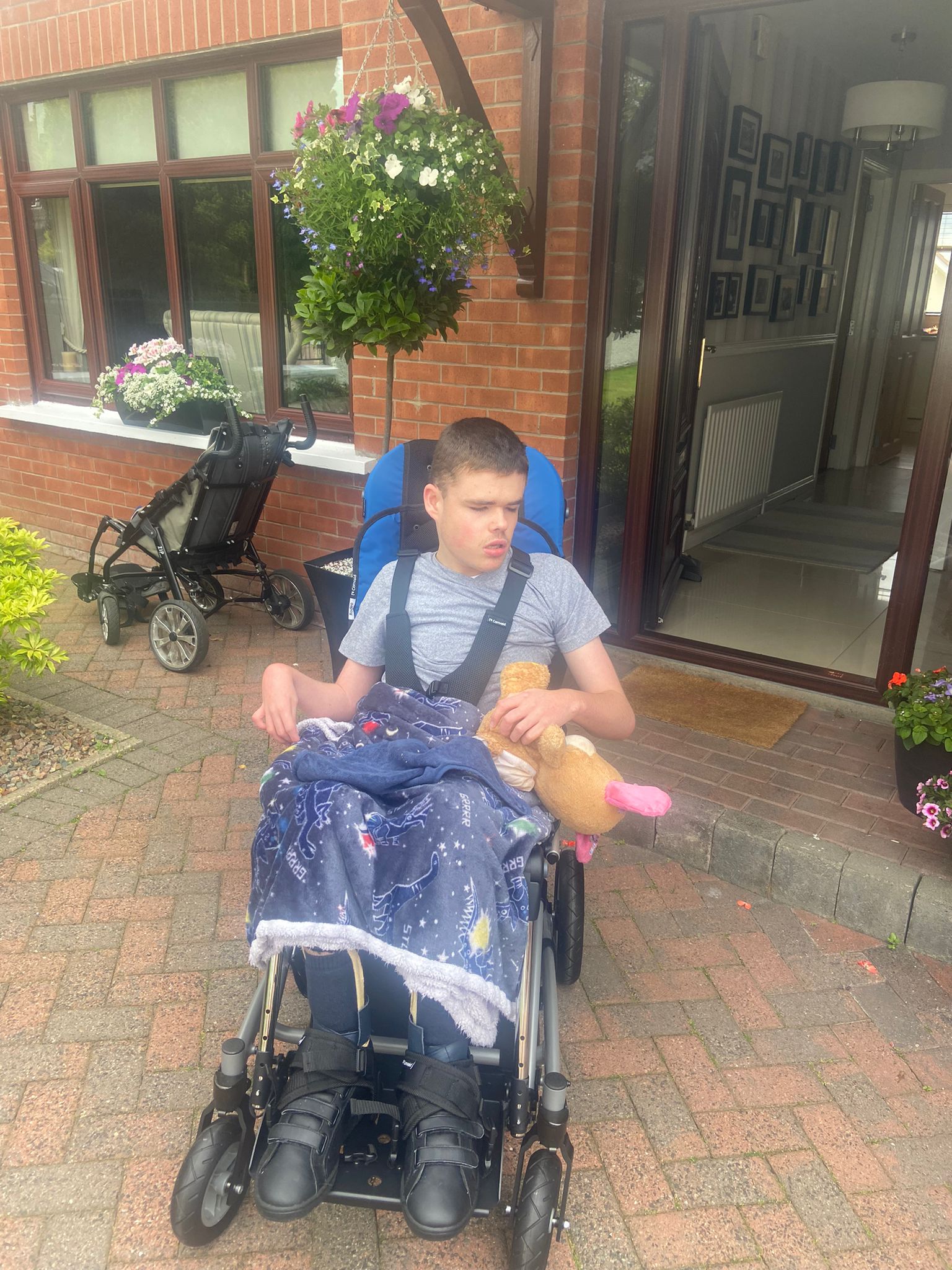 RELIEF: Conleth Pierce in his new wheelchair