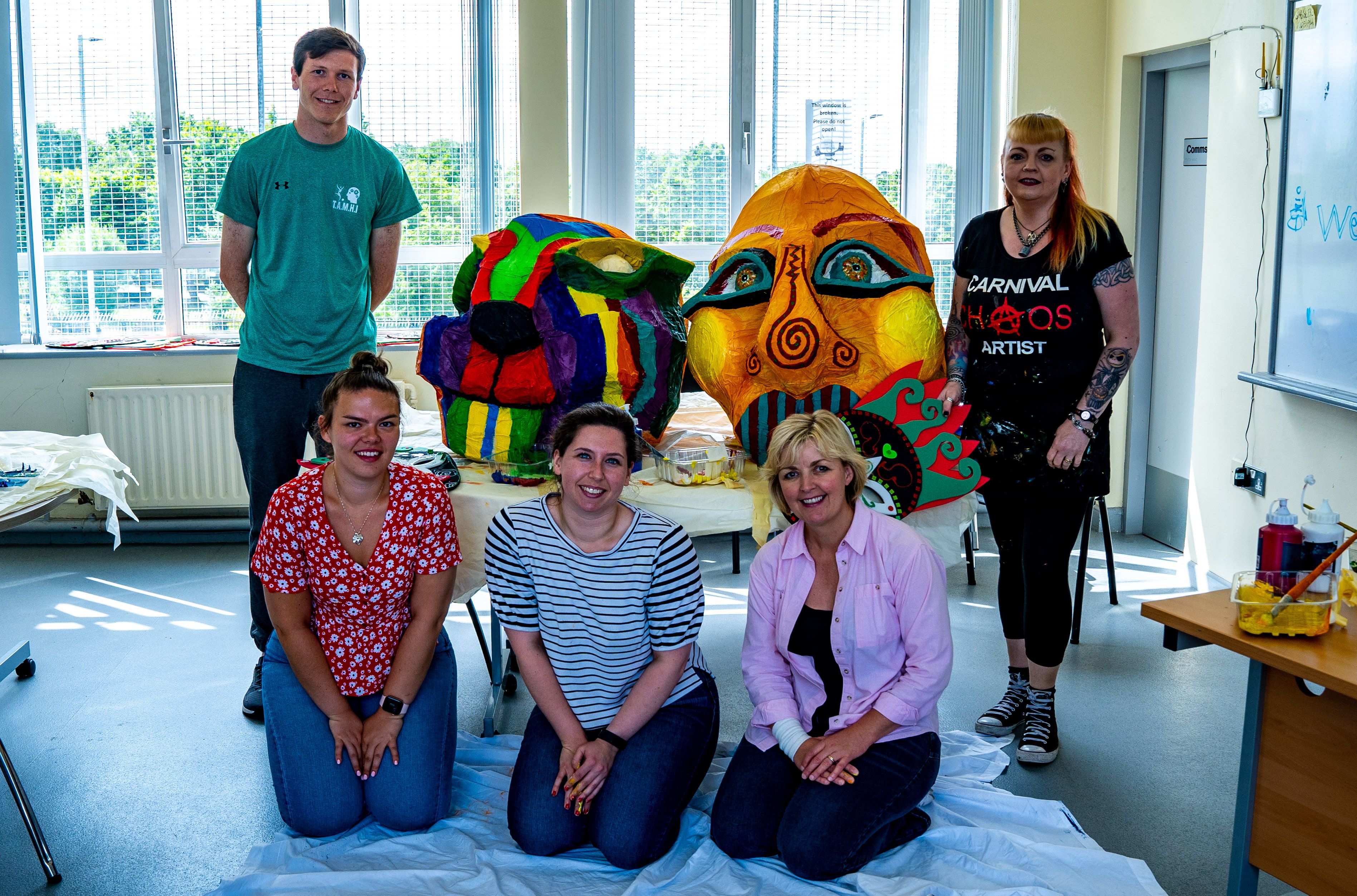 COLOURFUL: Johnny McCann, Margaret McCann, Shannon Magee, Rachel Davey and Jo-Anne McGeagh prepare for this year\'s carnival parade