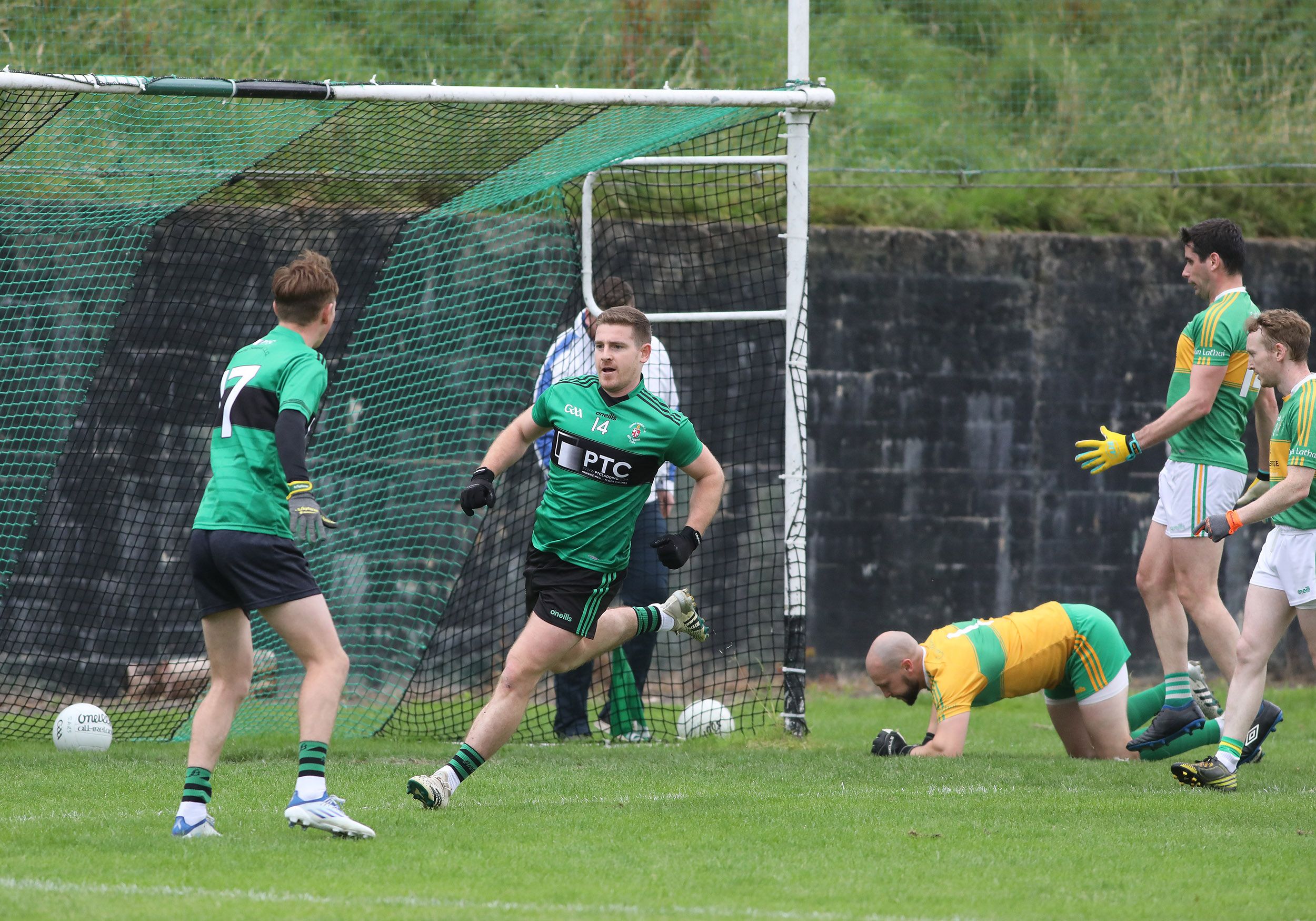 Gary Lennon wheels away after finding the net for Sarsfield\'s
