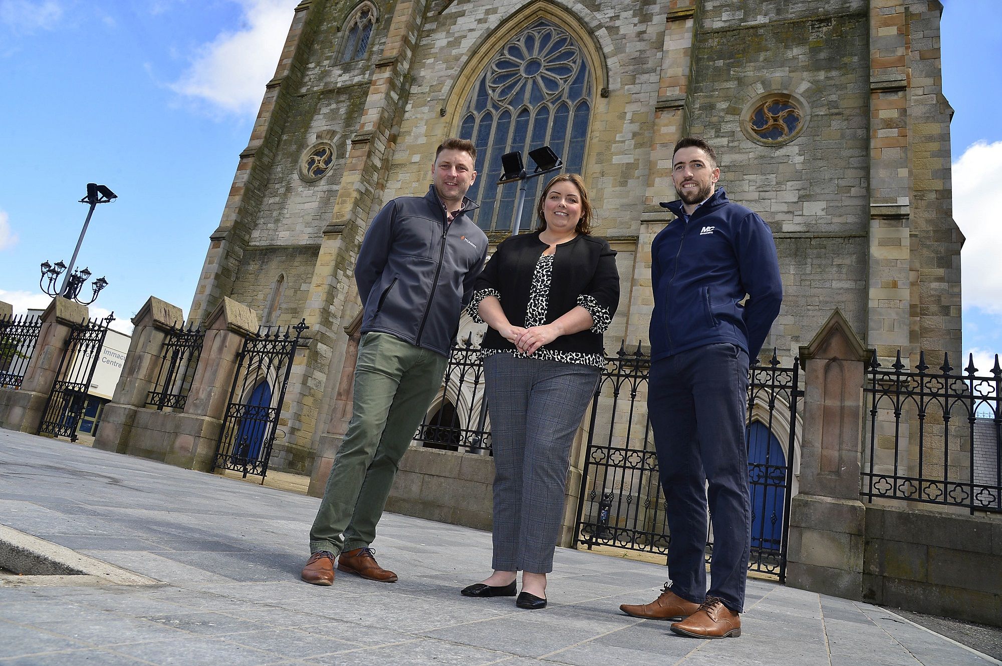 PUBLIC REALM: Communities Minister Deirdre Hargey pictured with Project Manager Eddie Abraham from McAdam Design Ltd and Conor McConville, Project Manager at FP McCann
