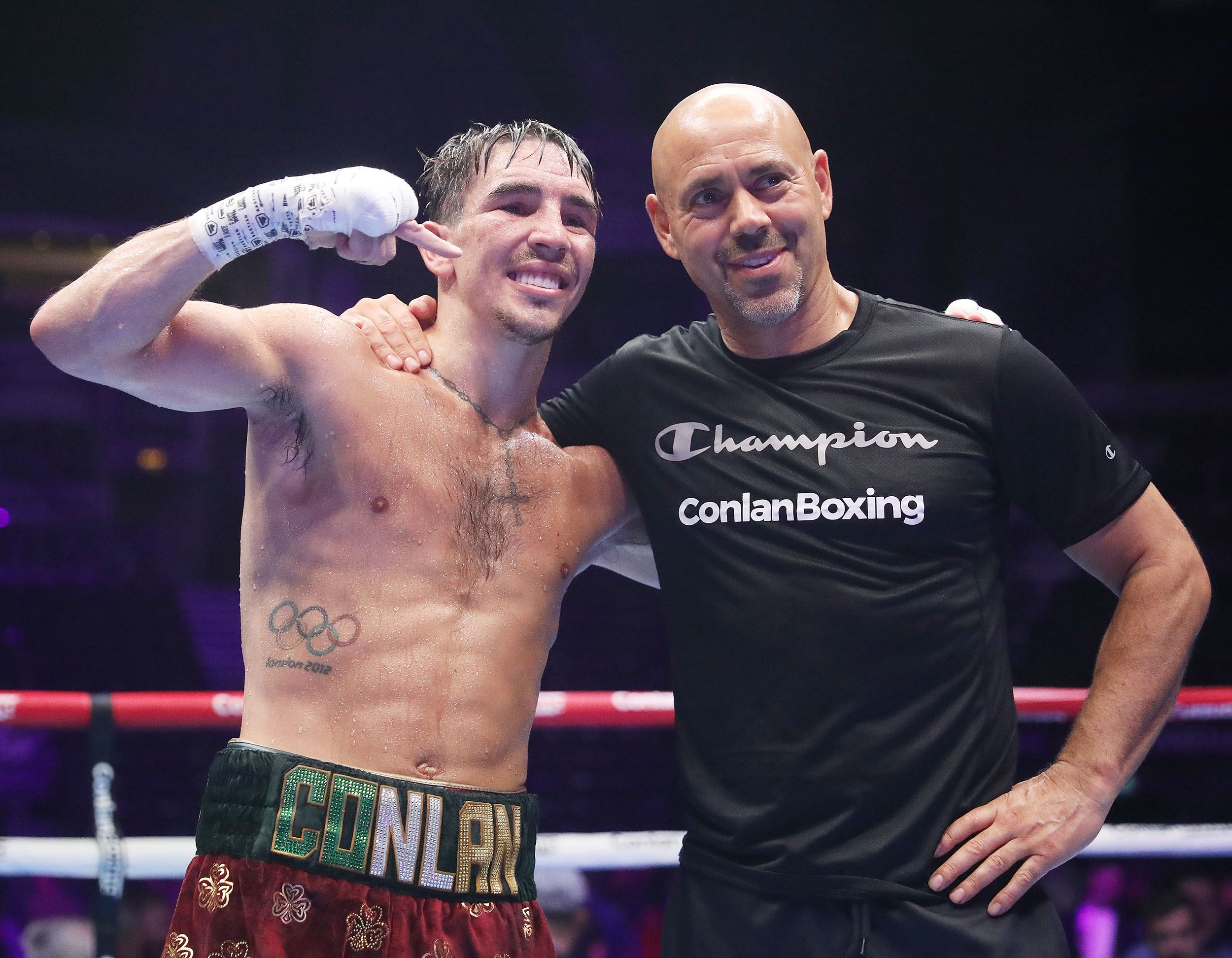 Michael Conlan with head coach Adam Booth after Saturday\'s win against Miguel Marriaga 