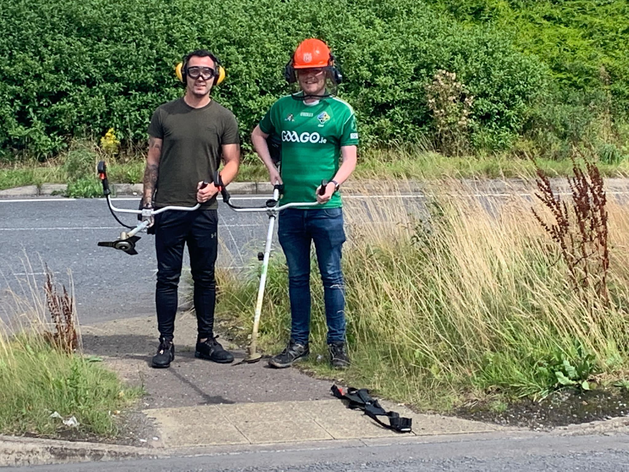 TRIMMED: Councillors Michael Donnelly and Ronan McLaughlin took measures into their own hands and trimmed the vegetation 