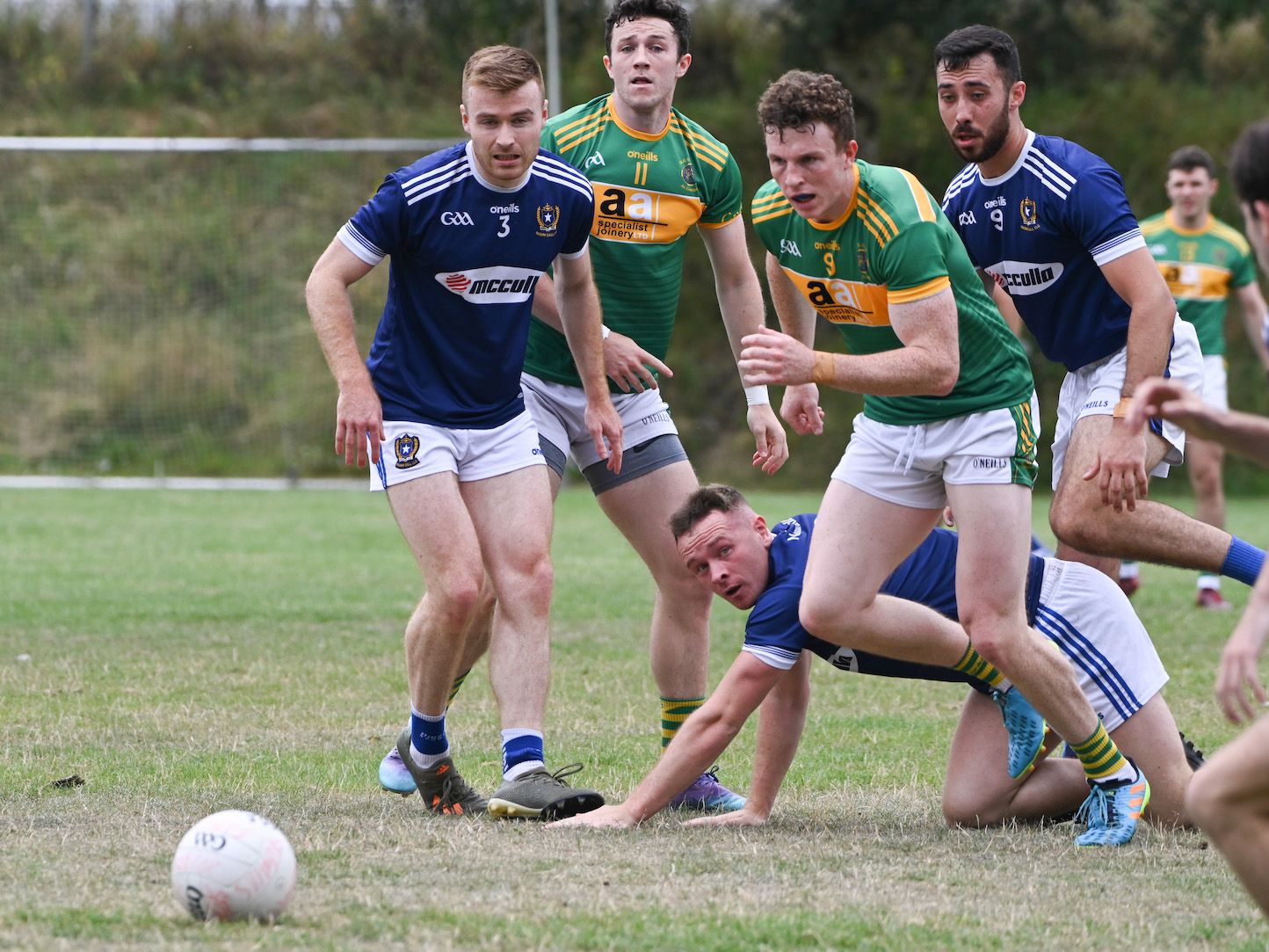 The ball spills loose during Sunday\'s game at De La Salle Park 