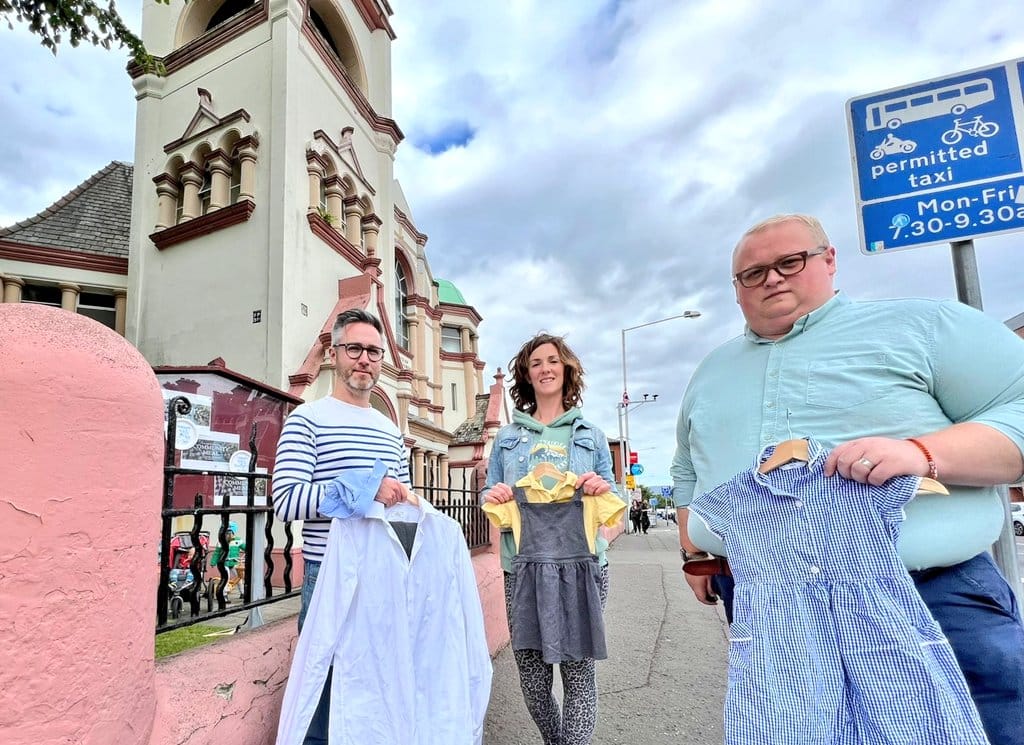 UNIFORM SWAP SHOP: SDLP Councillors Gary McKeown and Séamas de Faoite with Kerry Lynn from Open Ormeau