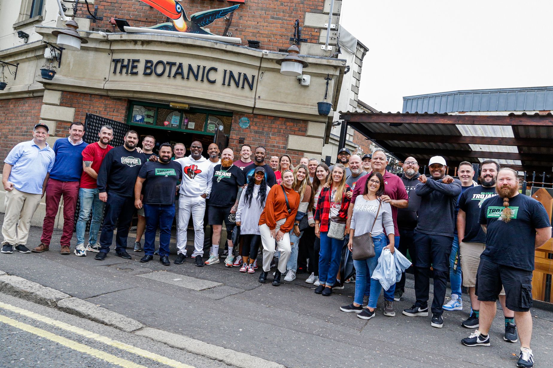 Players from the Belfast Trojans greet former Nebraska players and some of their travelling fans at the Botanic Inn on Tuesday