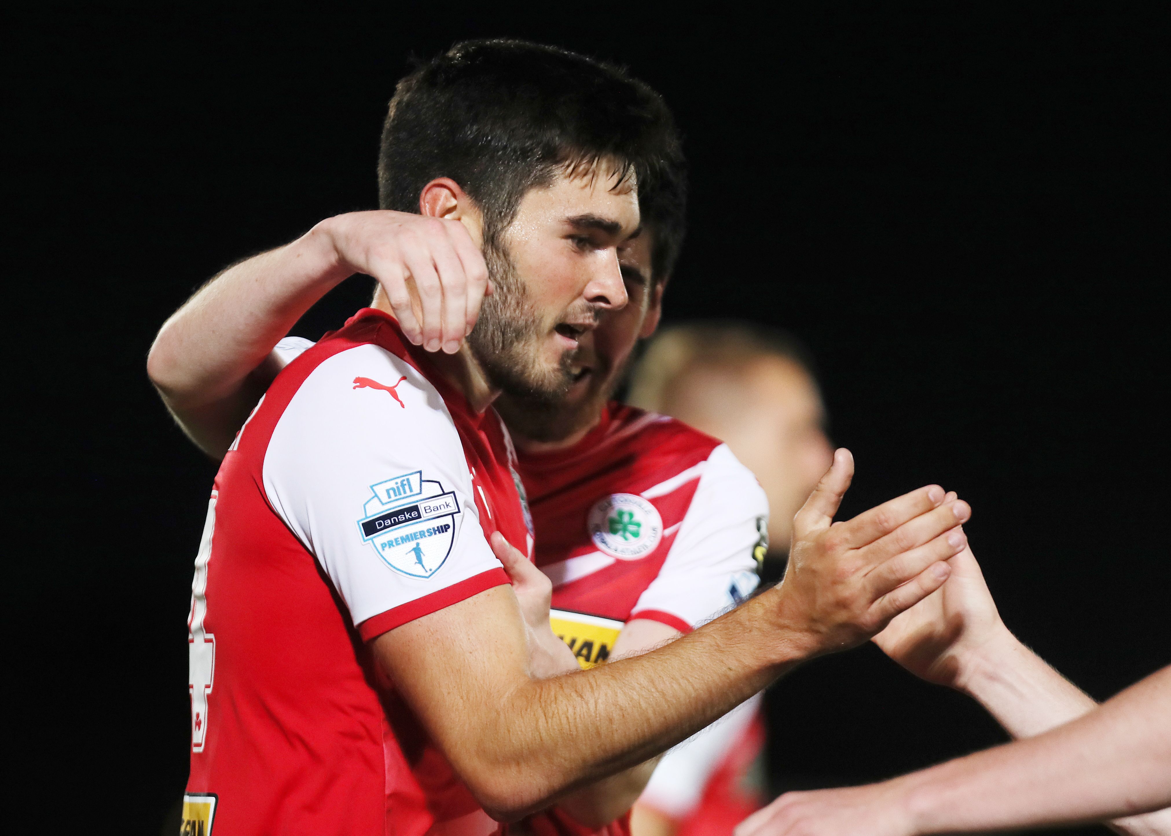 Luke Turner - pictured after scoring the winner on Tuesday at Ballymena - has come in for praise from Paddy McLaughlin