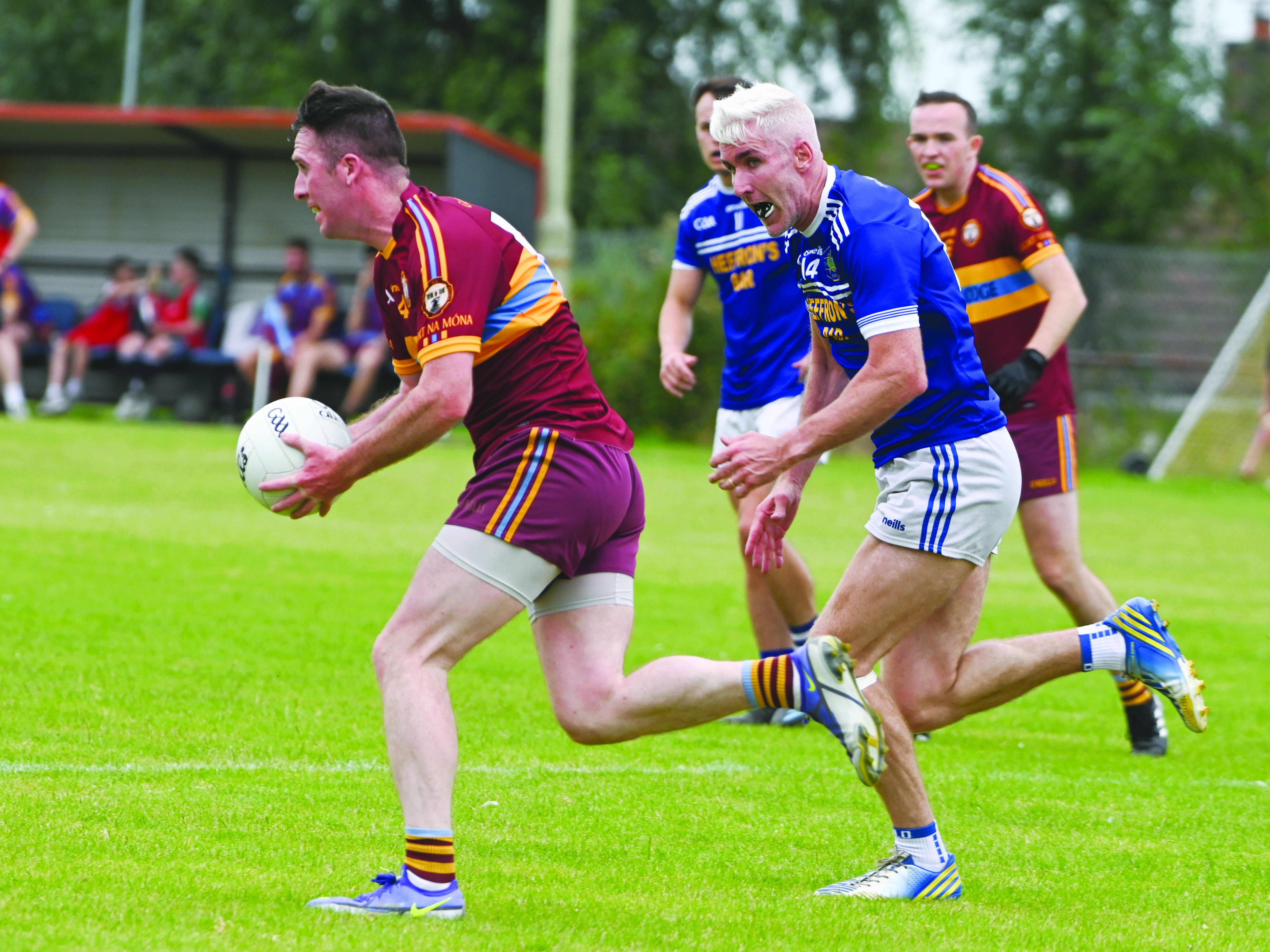 Gort na Móna’s draw with Tír na nÓg was enough to see them reach the last eight due to a better scoring difference over the Randalstown outfit