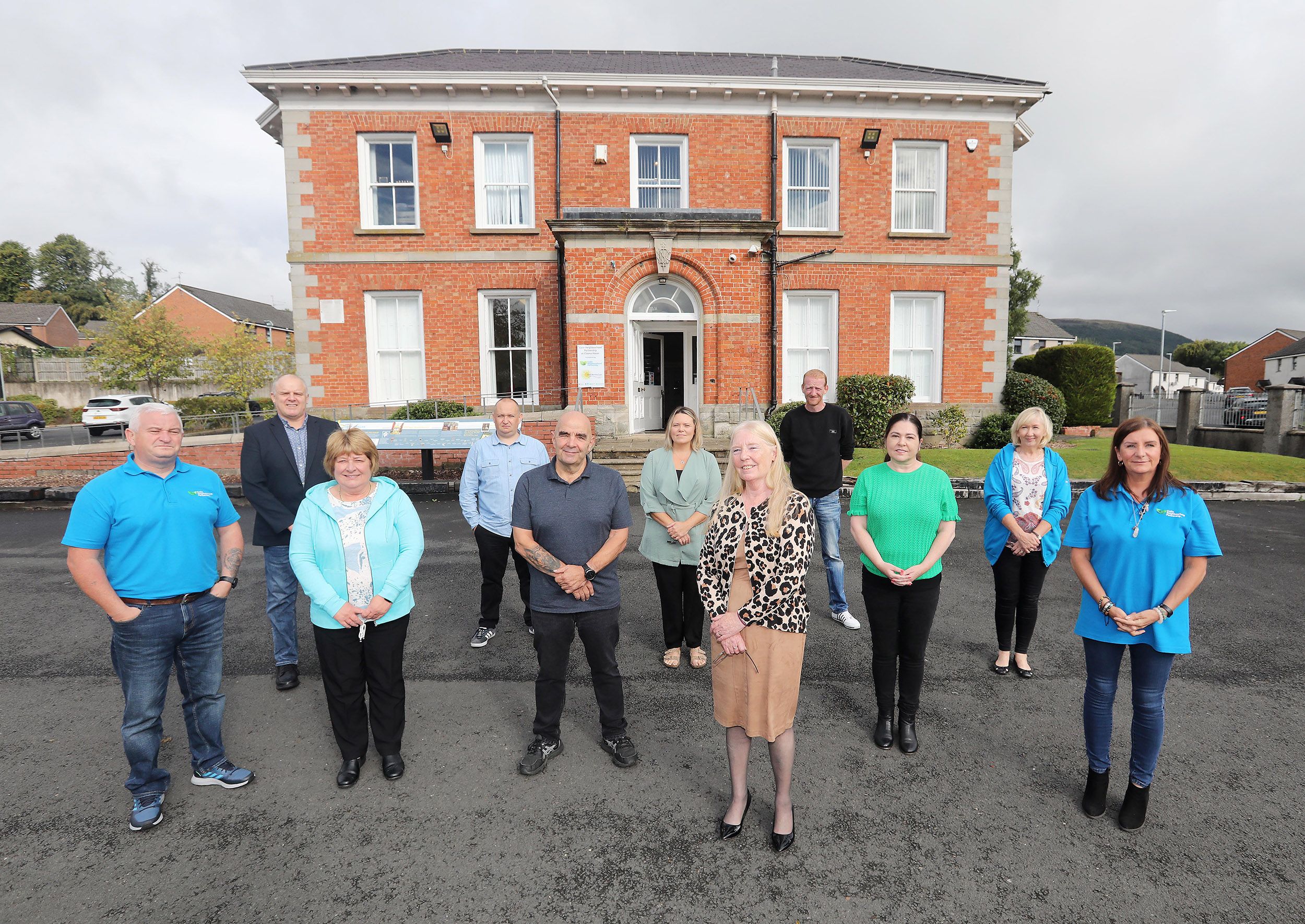 WORKING HARD: Members of Colin Neighbourhood Partnership outside Cloona House