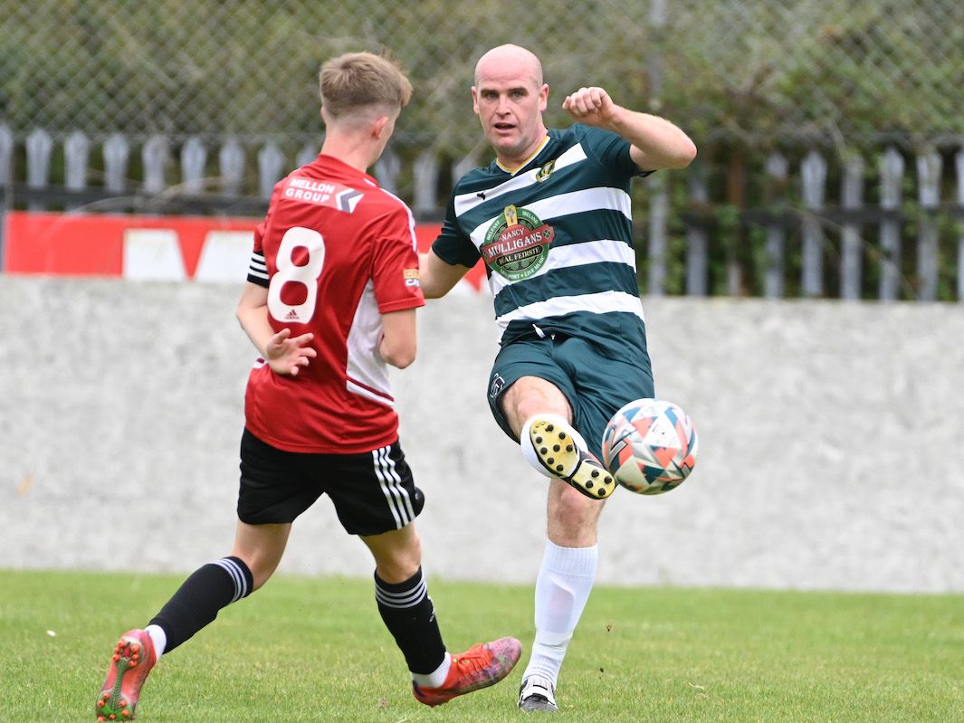 Stephen Tully gets his pass away during Belfast Celtic\'s 6-1 win over Maiden City 