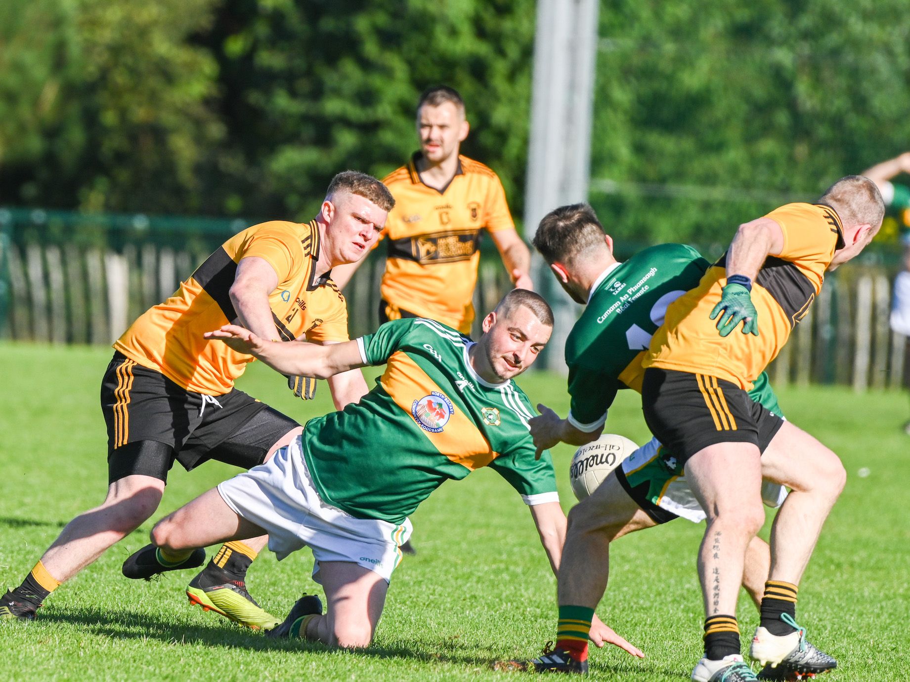 The ball squirts free during Saturday\'s Antrim JFC semi-final at Cherryvale