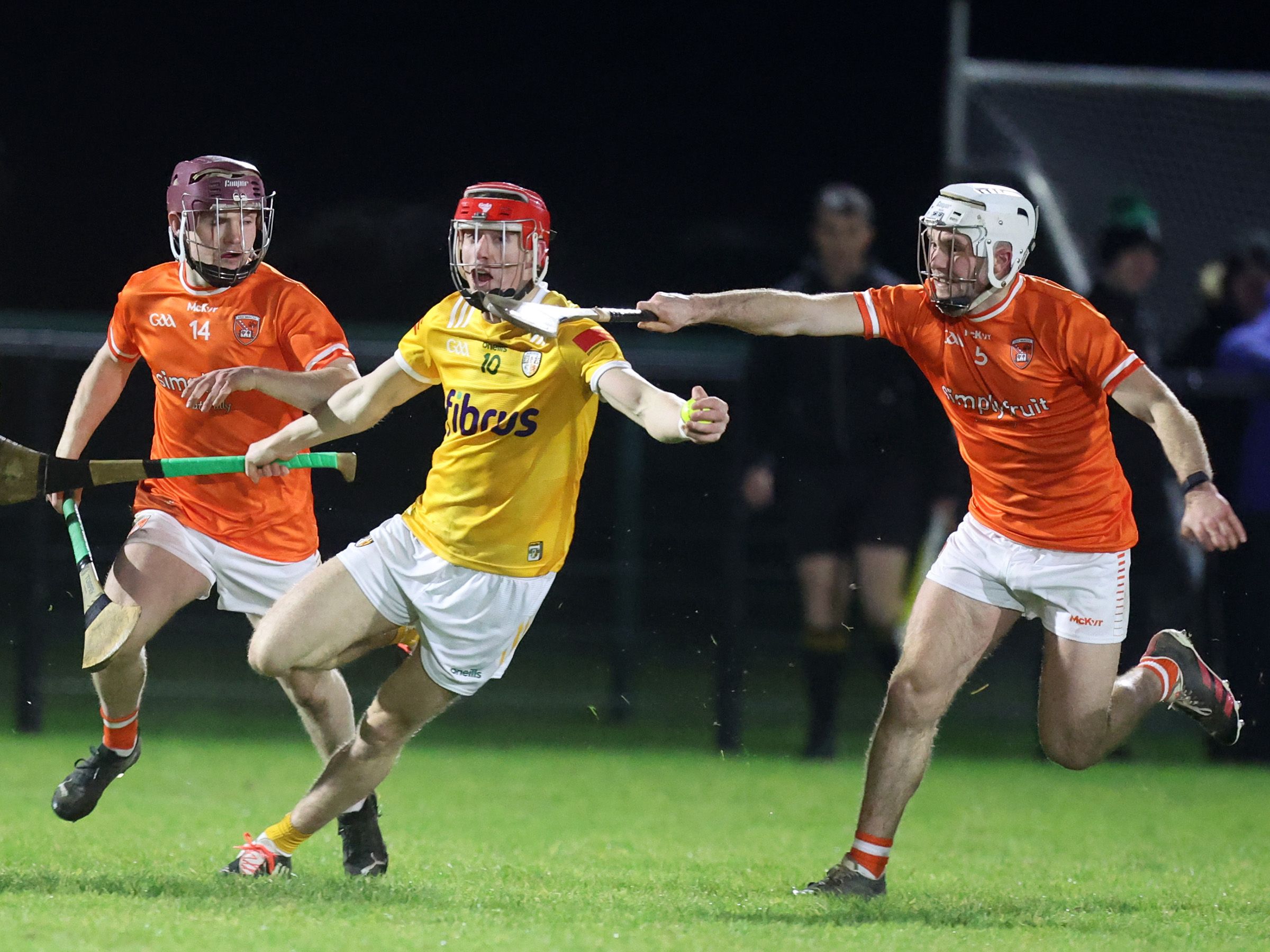 James McNaughton is challenged by Kane Laverty at Dunsilly on Monday evening 