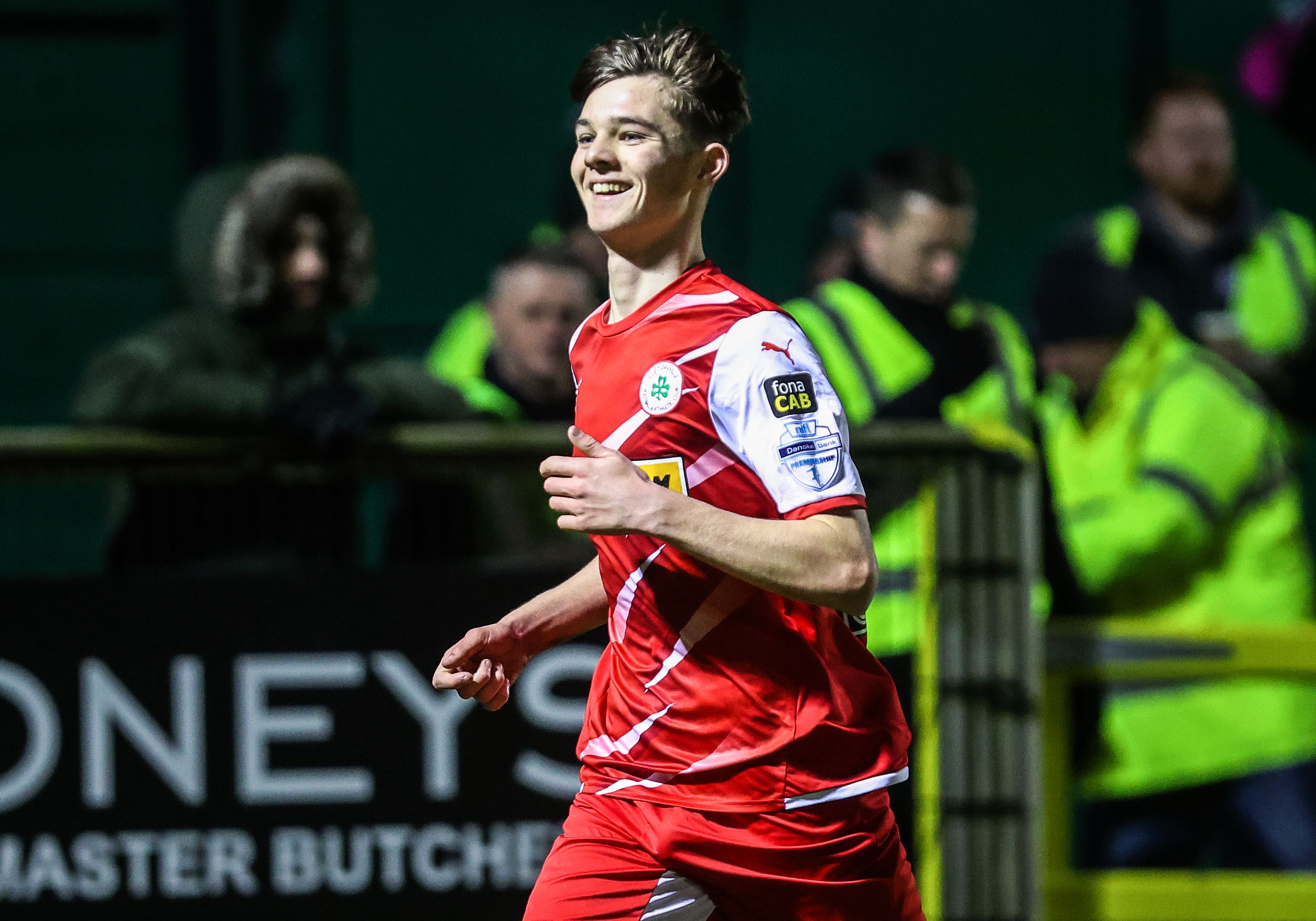 Speculation surrounding the international status of 17-year-old Sean Moore has drawn criticism from Cliftonville manager Paddy McLaughlin who blasted the pressure put on the teenager