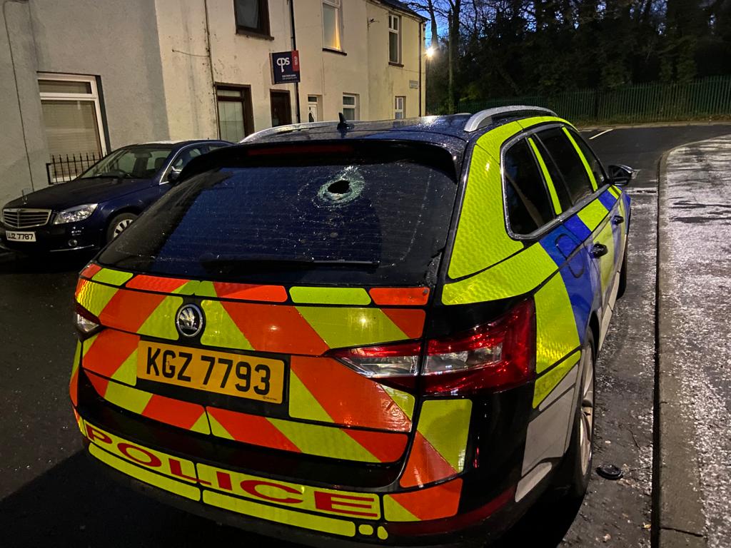 A police vehicle was damaged on Tuesday night\'s attack in Lenadoon