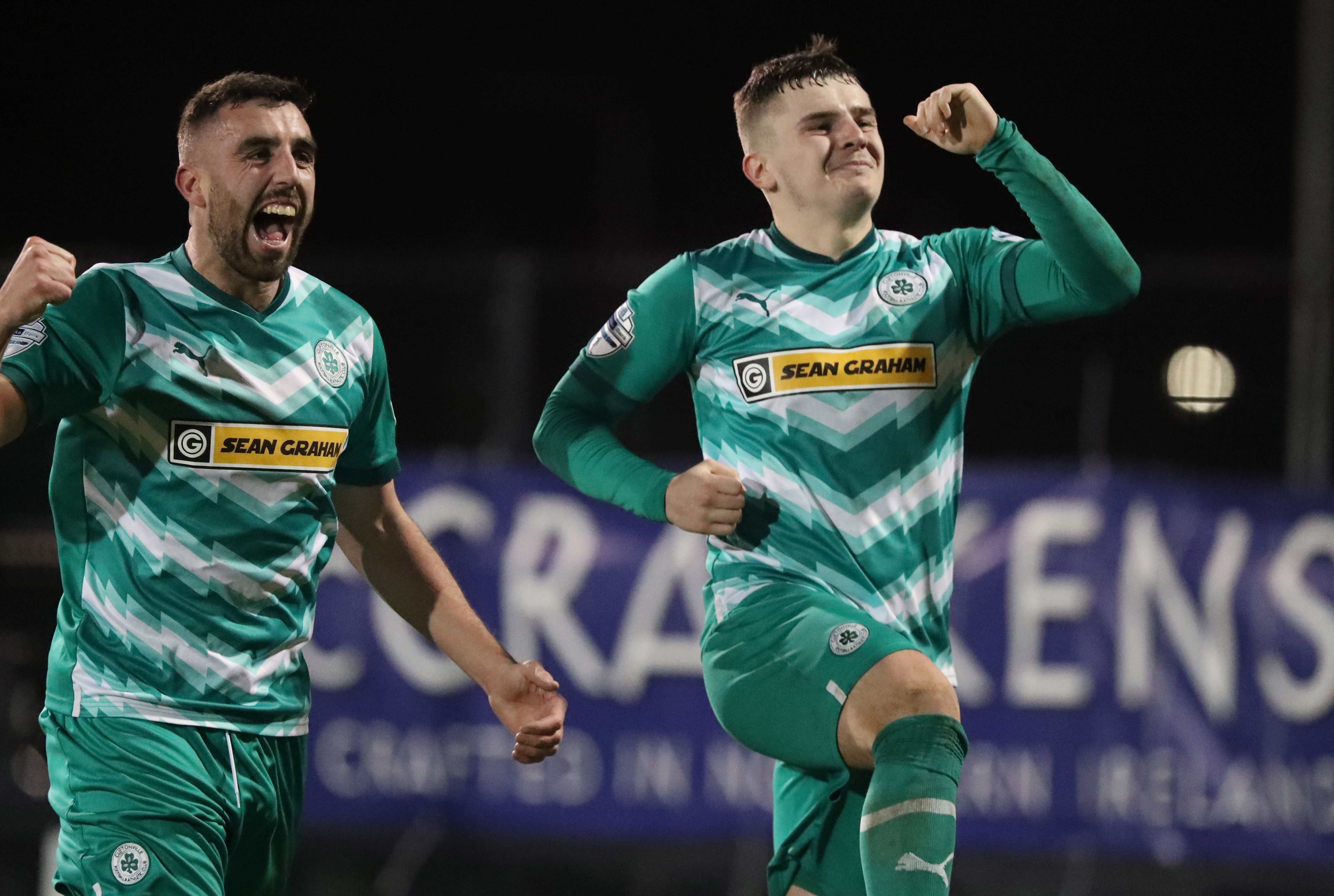 Rory Hale celebrates with Joe Gormley after wrapping up Cliftonville\'s in at Mourneview Park
