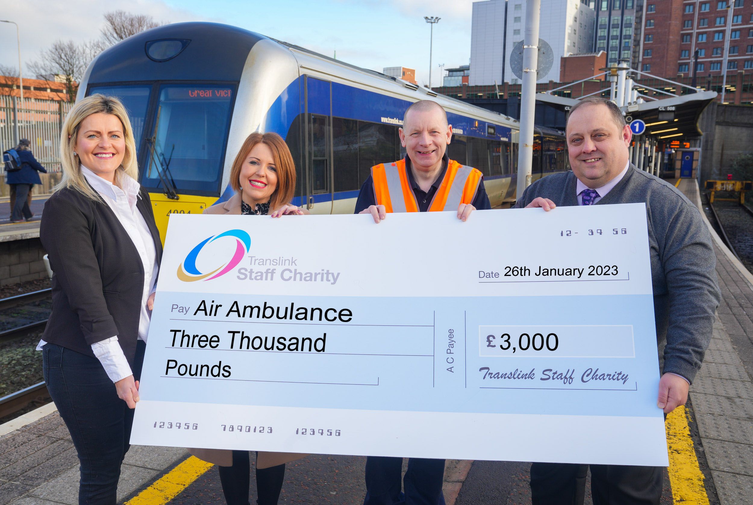 FLYING HIGH: Air Ambulance’s Colleen Milligan with Translink Staff Charity Fund representative Lynsey Fee and colleagues Ronnie Martin and Colin Burns