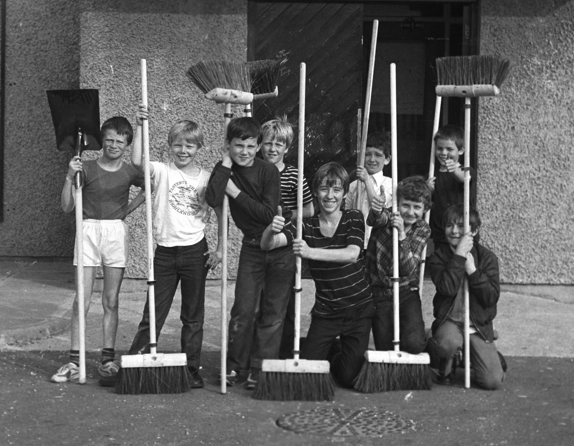 IN THIS TOGETHER: Children brushing the streets of Ardoyne during a major community clean-up