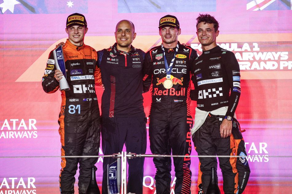 TRIUMPH: Max Verstappen claimed the title in the blistering heat of Qatar