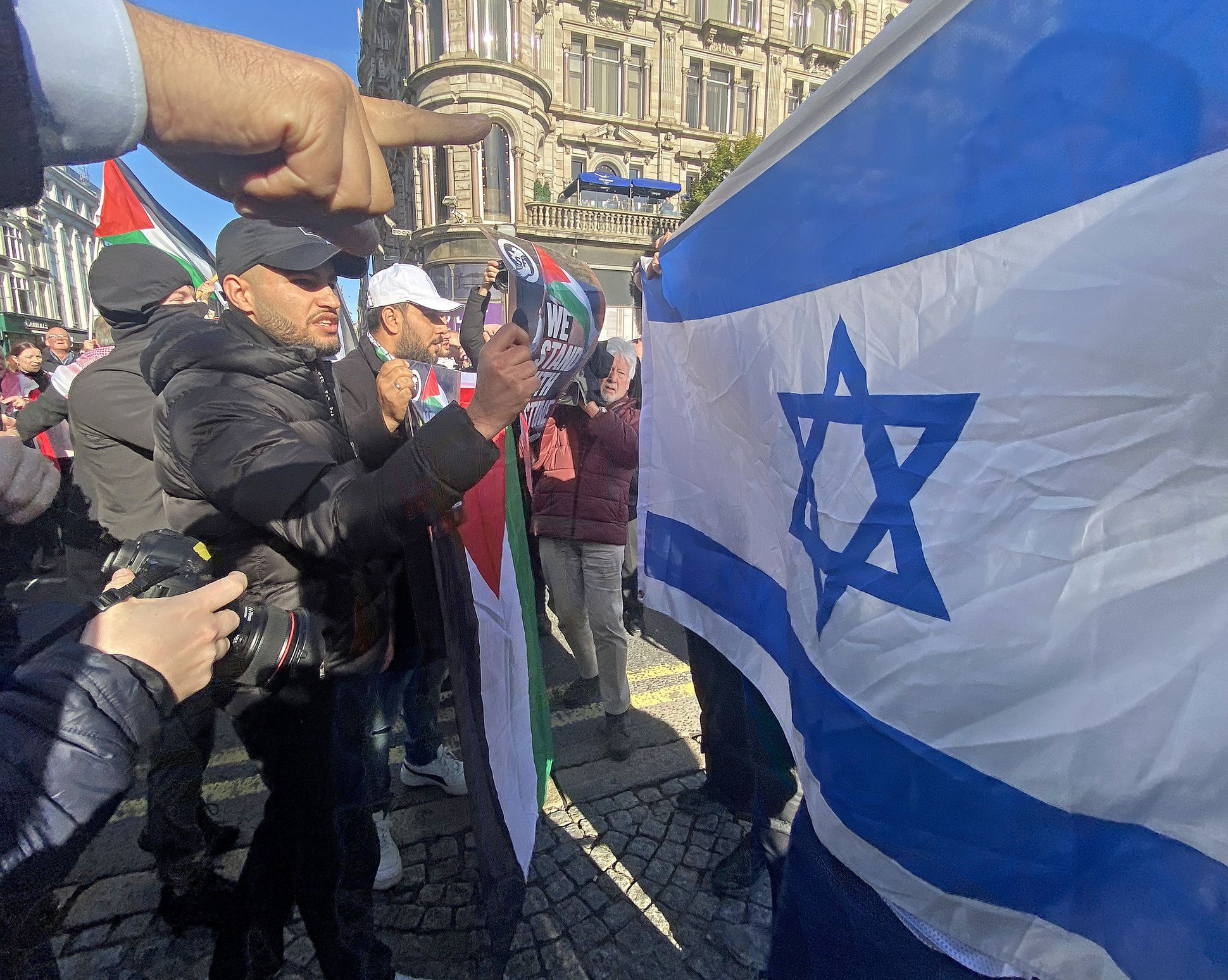 PROTEST; A small contingent of Israel supporters arrived but soon left