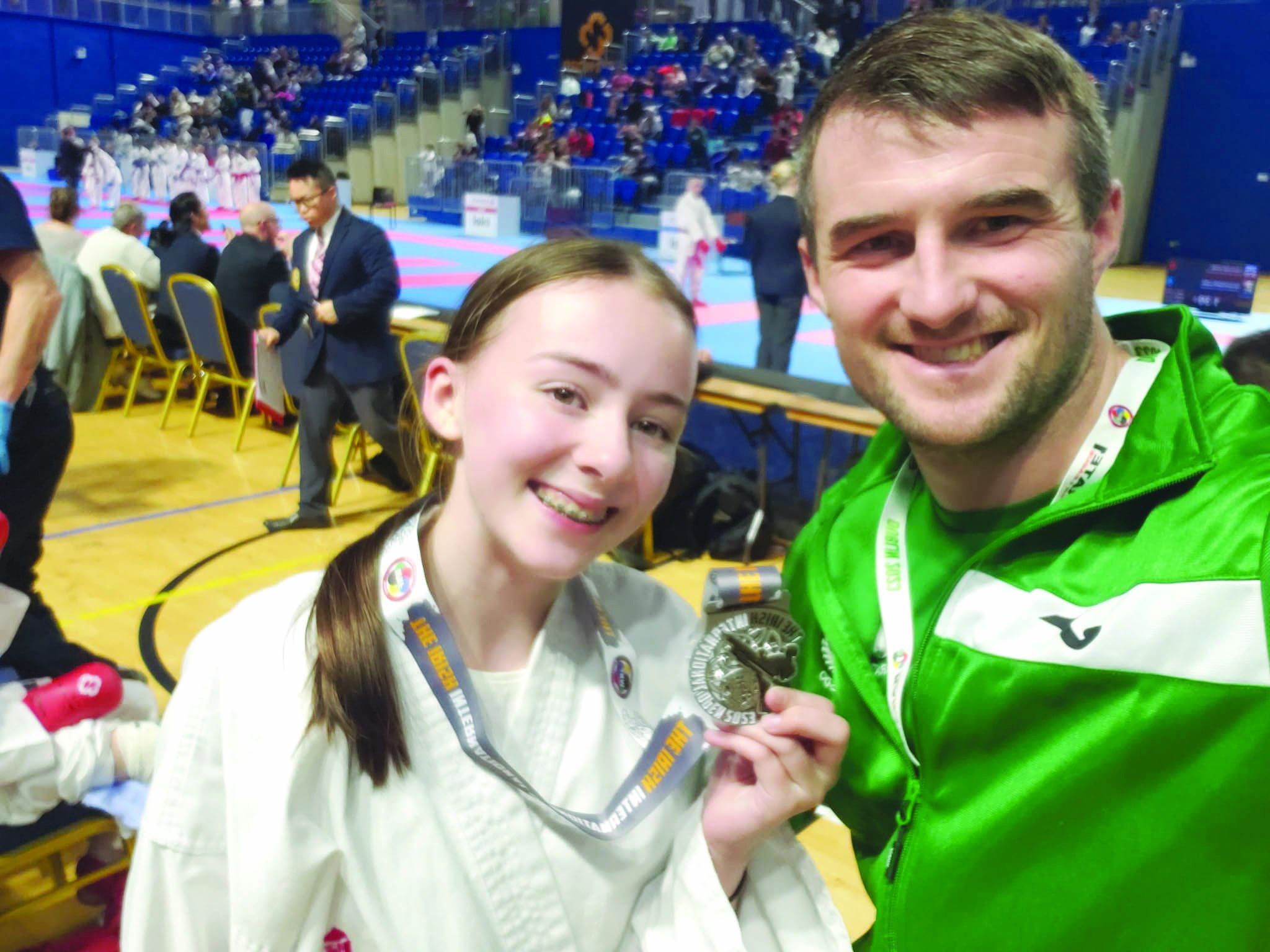 All smiles as Irish Open International silver medallist Tierna Lavery is congratulated by Northern Ireland coach James Brunton