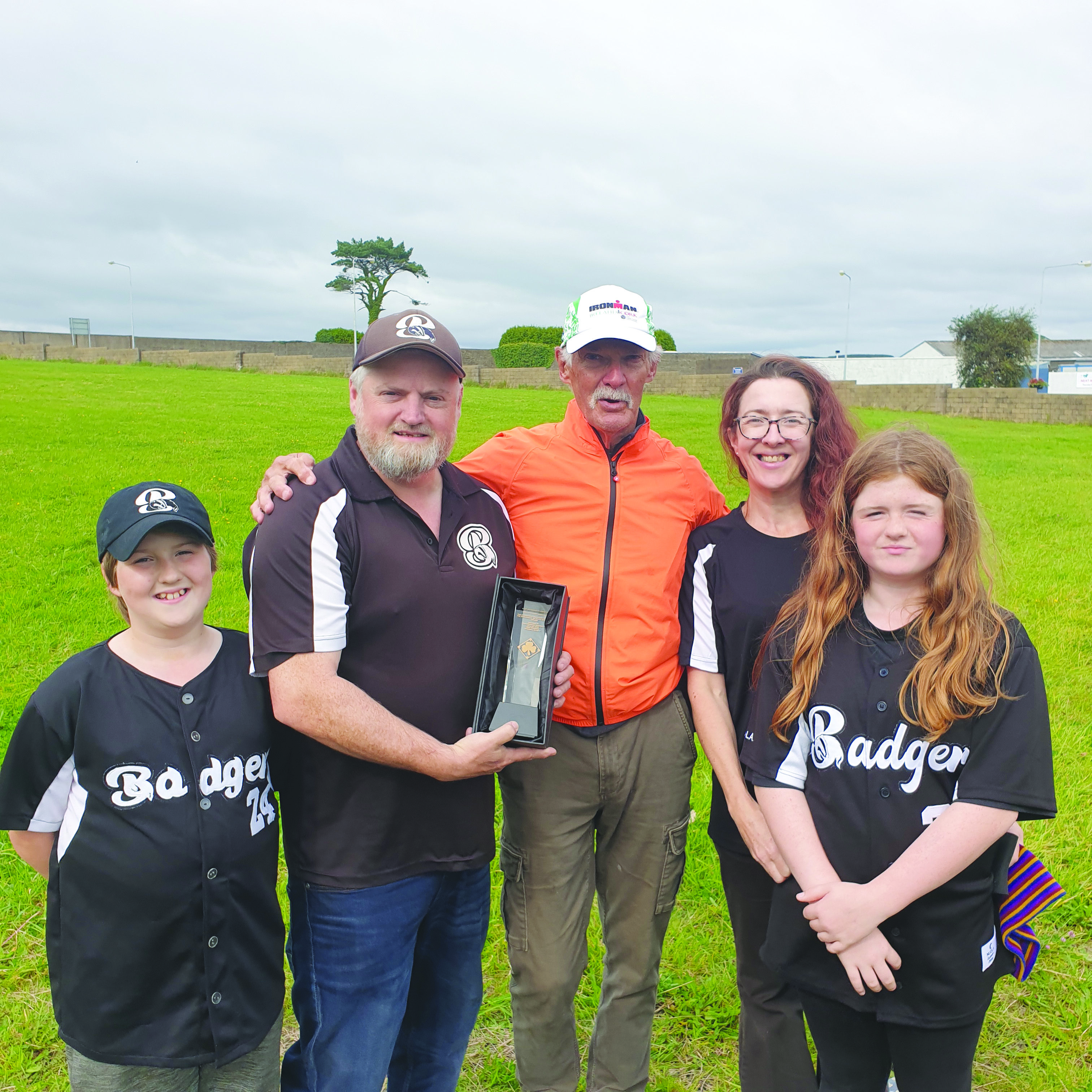 Clive Butterworth’s son, Simon, presents the award named after his father to Terry and Heather Rosbotham and their children in Tramore recently