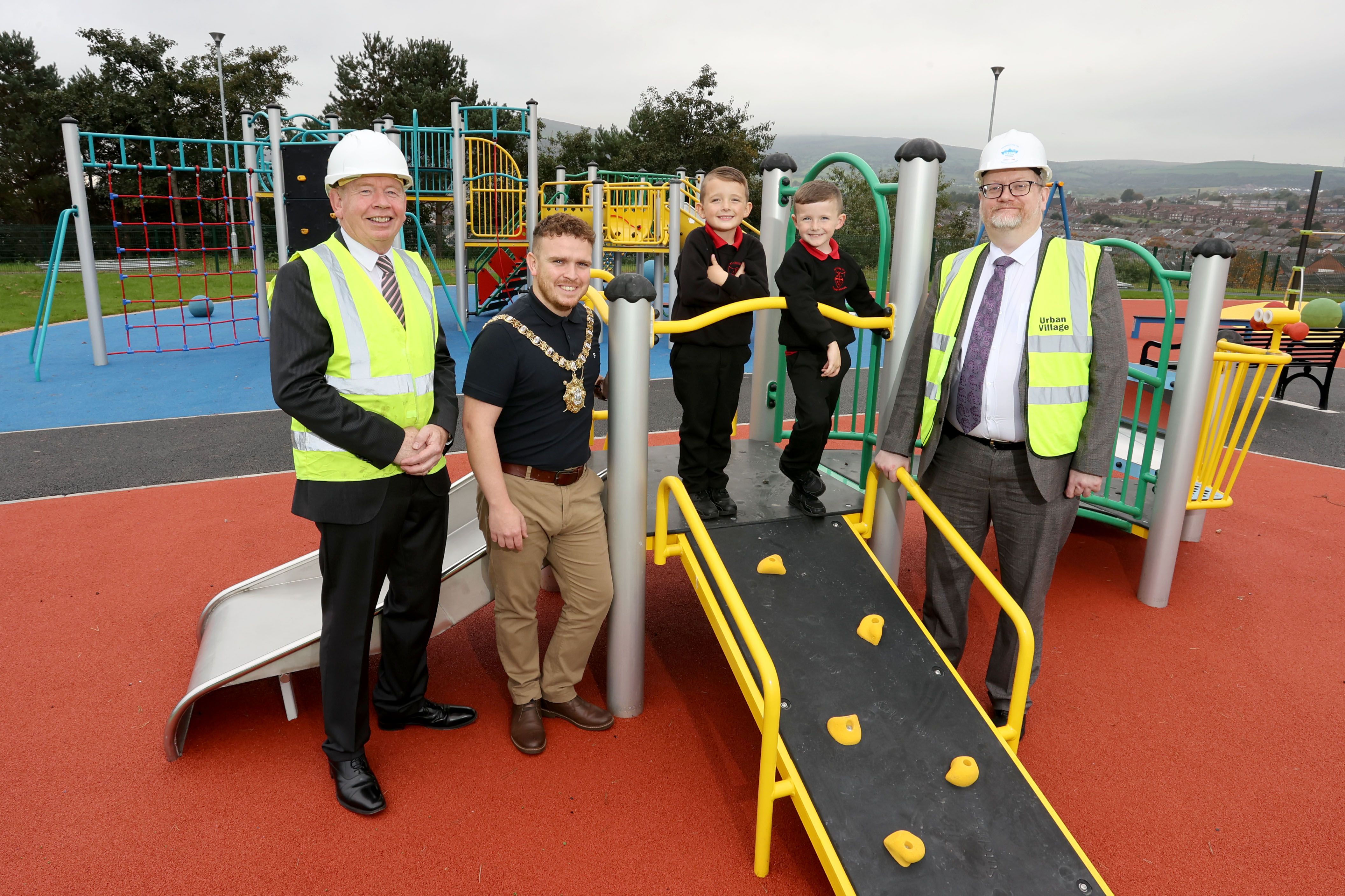 REOPENING: Belfast Lord Mayor Councillor Ryan Murphy, Patrick Anderson (Department for Communities), Cohan Carson and Cian Carson from Holy Cross Boys’ Primary School and Gareth Johnston (Executive Office).