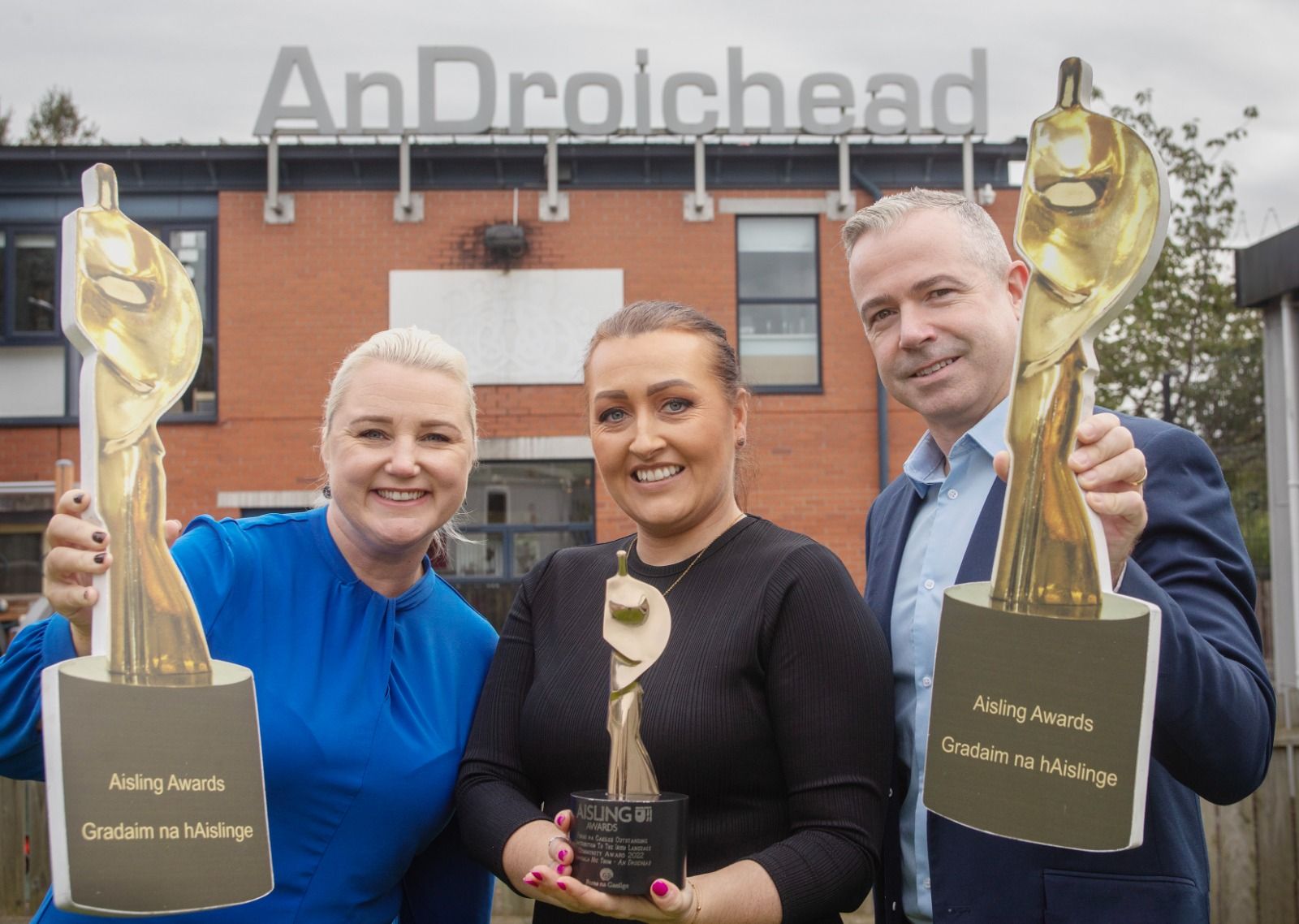 TIGHT RACE: Connla McCann with last the 2022 Aisling Gaeilge champion Fionnuala Nic Thos and newly-appointed Foras na Gaeilge deputy CEO Pól Deeds