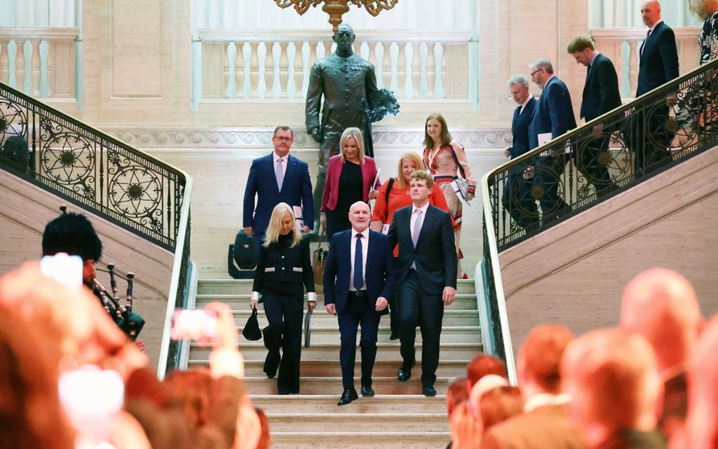 STORMONT DEBATE: Alex Maskey and US Ambassador to Court of St James Jane Hartley lead politicians into the Great Hall at Stormont for an event marking the 25th anniversary of the Good Friday Agreement