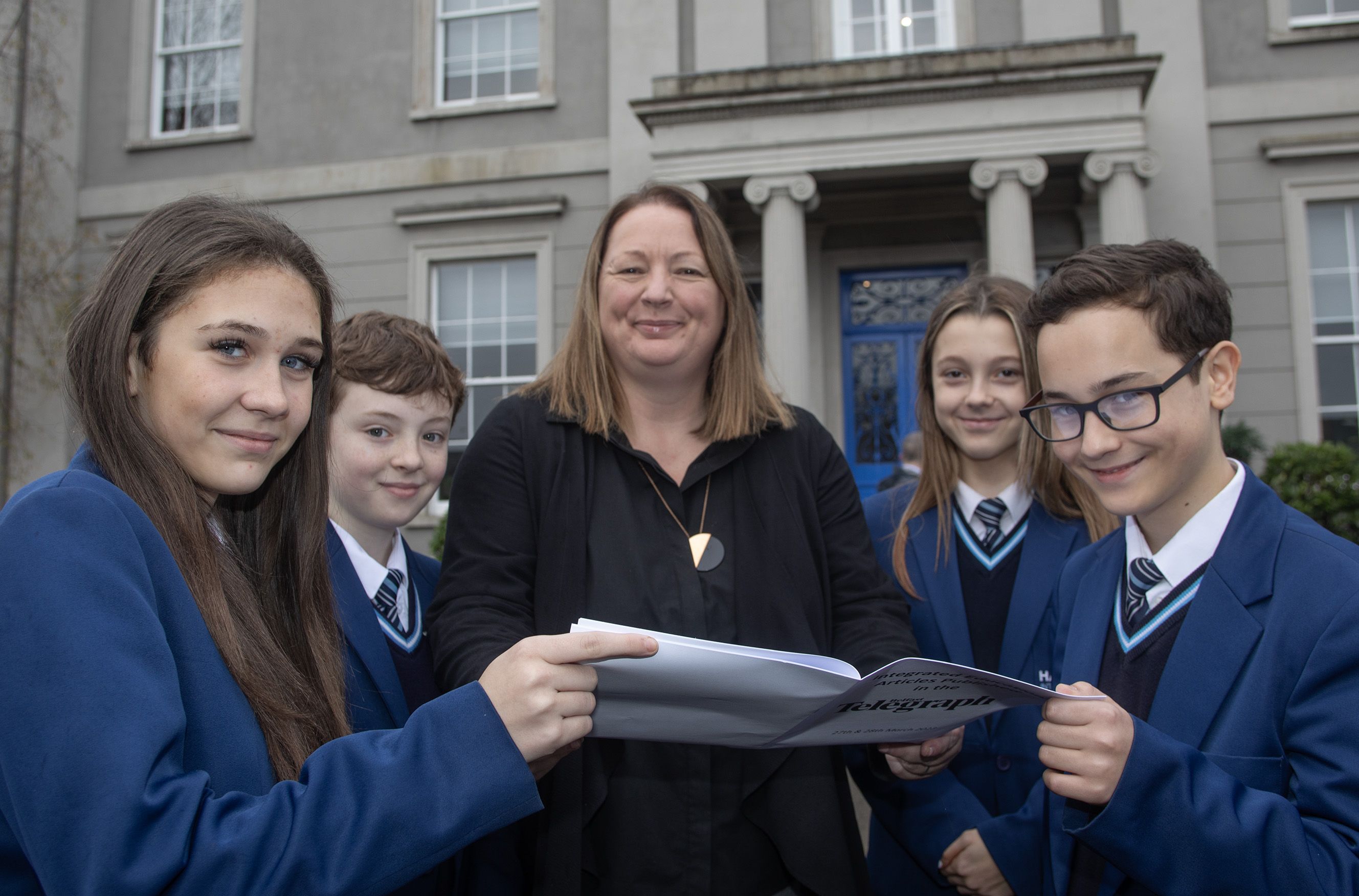 NEW PLANS: Máire Thompson (Principal of Hazelwood Integrated College) with pupils Liepa Karvauskaite, Caleb Higgins, Alesha Grogana and Dragos Petras