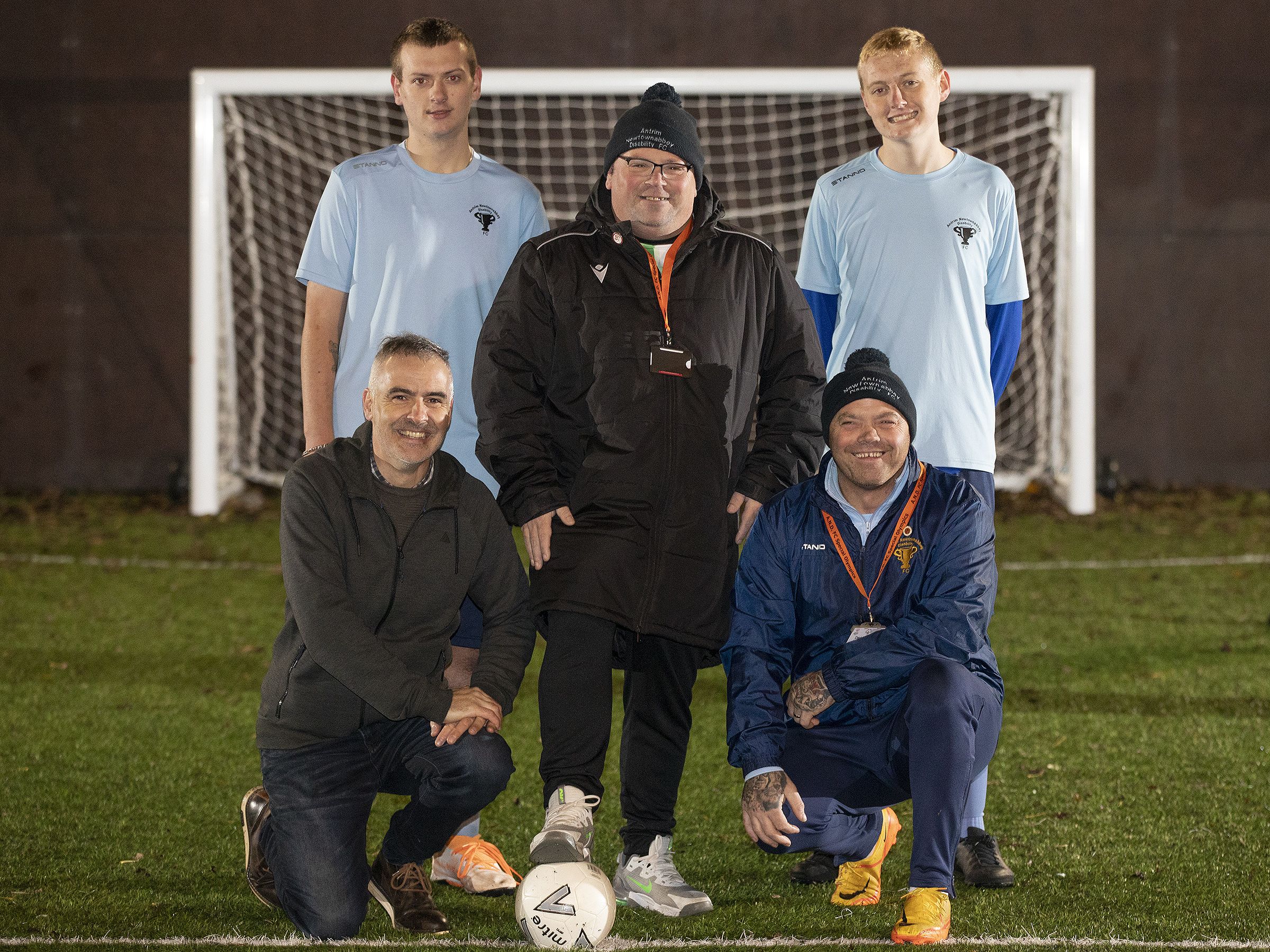 Jamie Bishop Evans and Jay Olphert, Antrim and Newtownabbey Disability Football Club athletes, with Jim McCracken, Shaun Cassidy and Dave Seawright