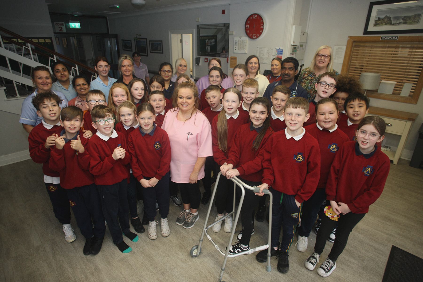 INTERGENERATIONAL PROJECT: P7 pupils from St Oliver Plunkett Primary School with staff from Louisville Nursing Home