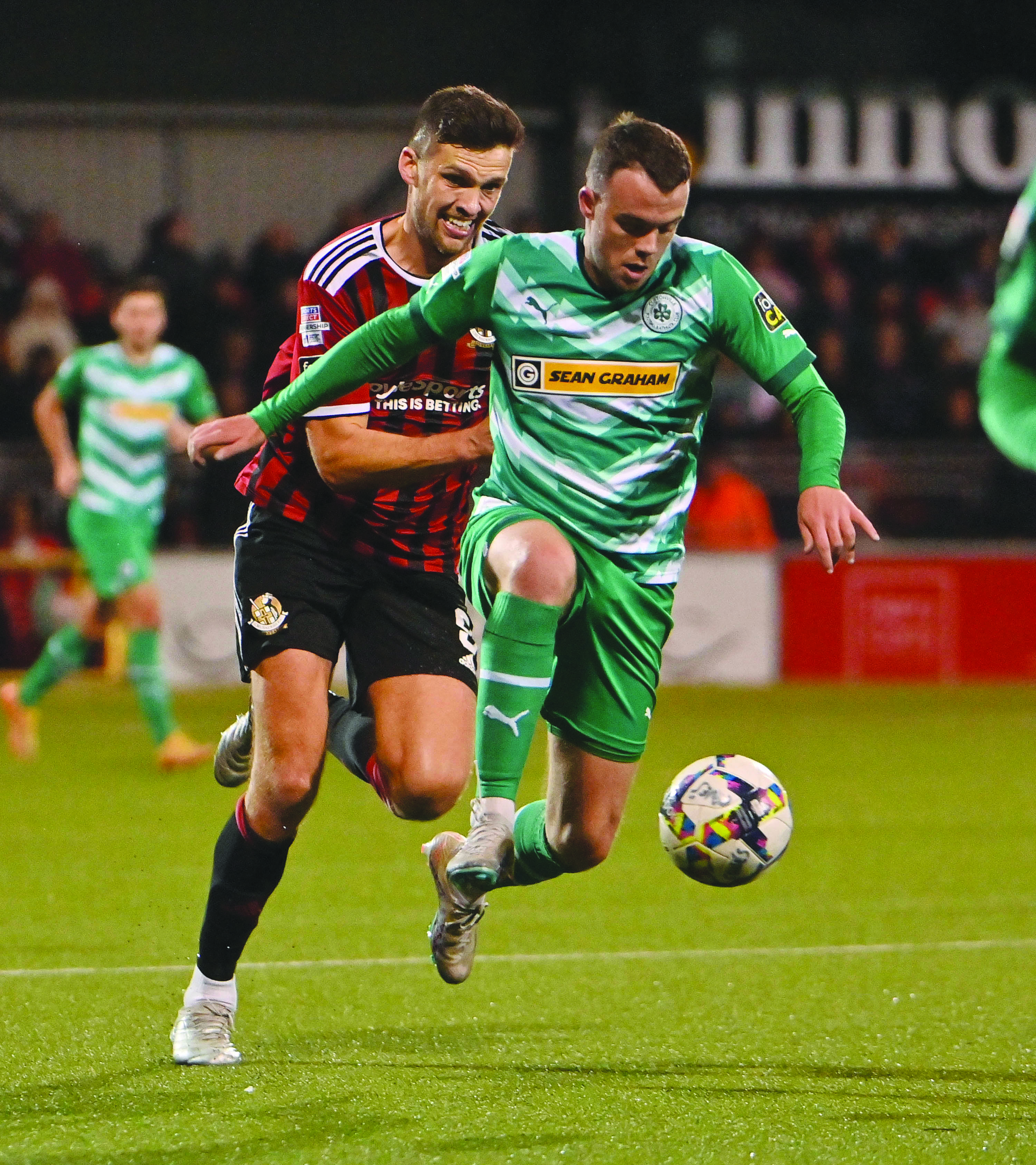 Chris Gallagher gets out in front of Adam Leckey during Cliftonville’s 3-0 win at Seaview in September