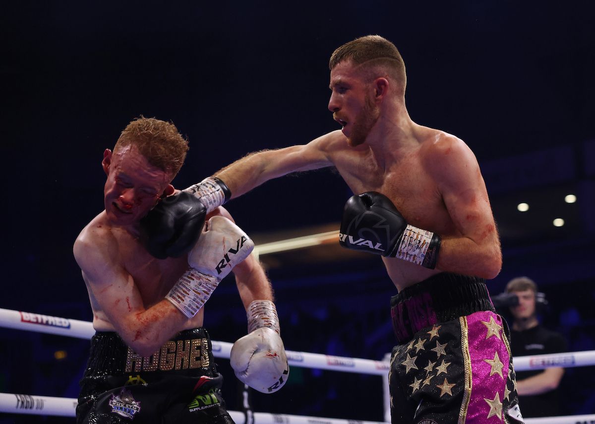 Ruadhan Farrell lands a right on Gerard Hughes during their super-bantamweight contest