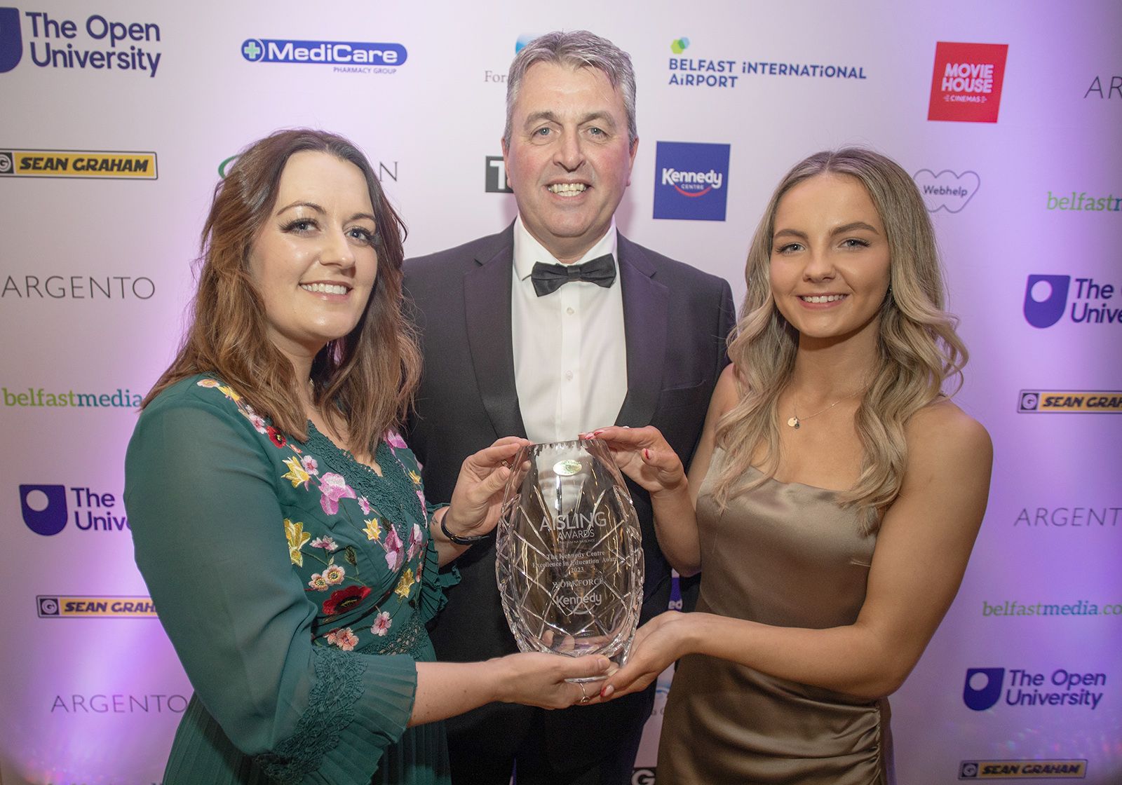 KENNEDY CENTRE EDUCATION AWARD: Joint-winners Workforce receive their award from Sarah Kennedy (right) from sponsors Kennedy Centre