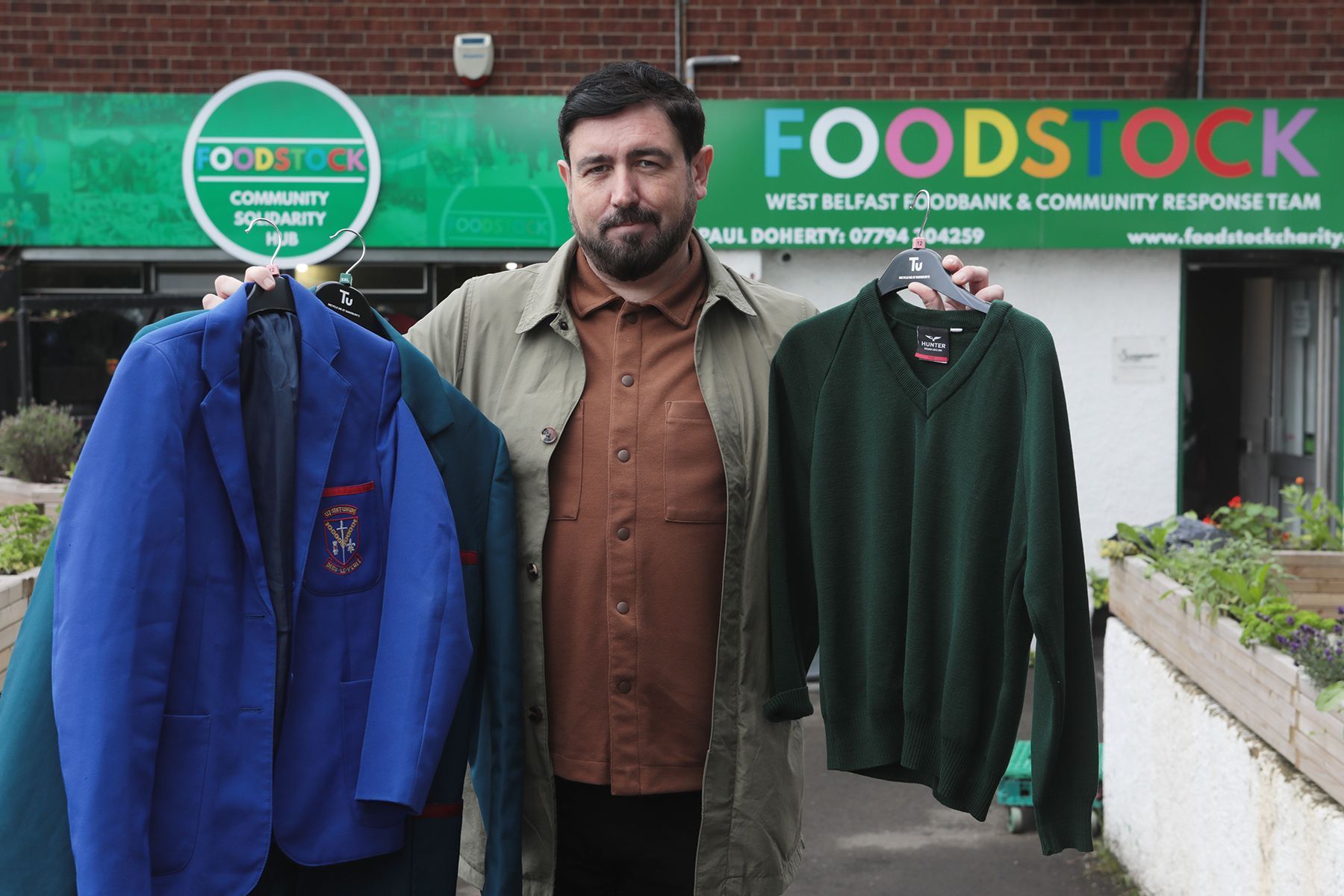 DEMAND: Councillor Paul Doherty with school uniforms from Foodstock which operates a \'pre-loved\' uniform hub