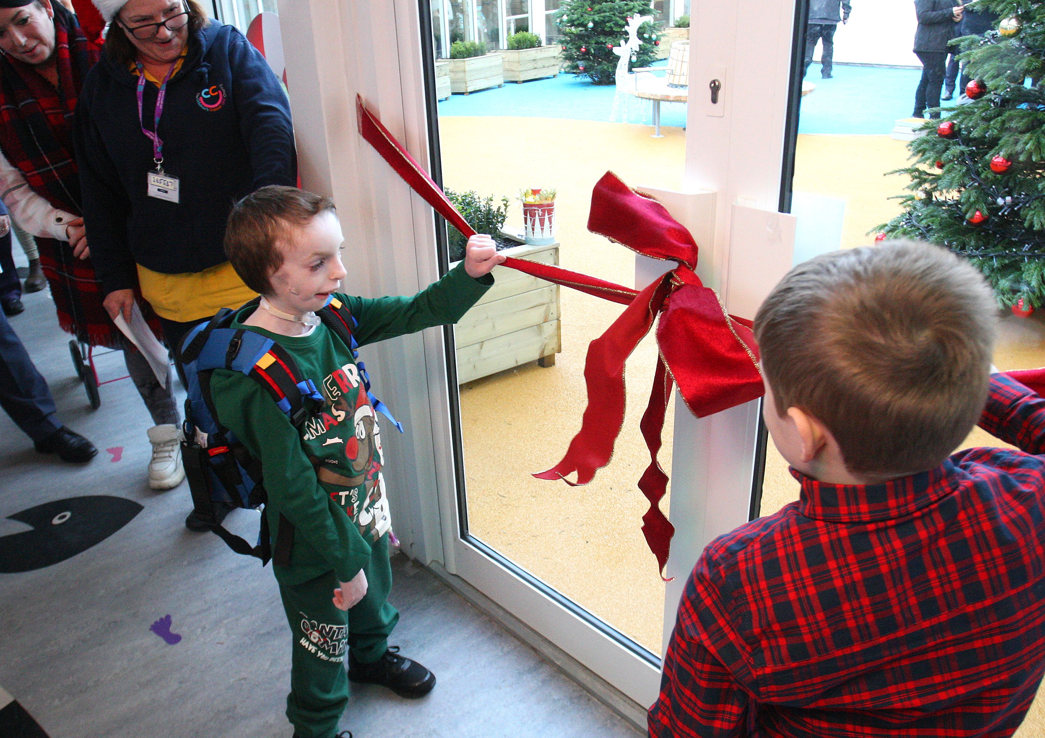 NEW THERAPY GARDEN: Finlay Pollock and Guy Smith cut the ribbon