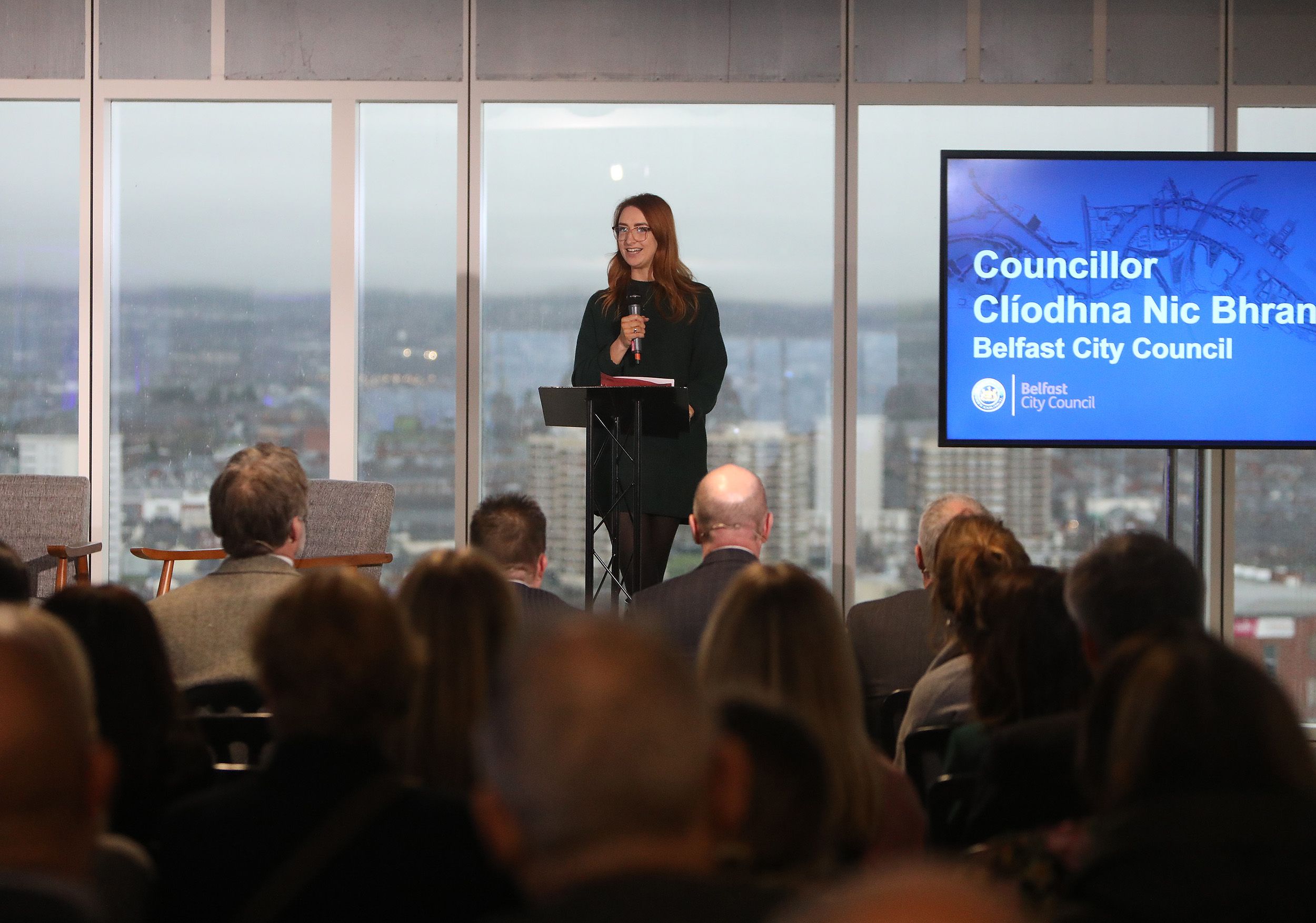 A RIVER RUNS THROUGH IT: Cllr Clíodhna Nic Bhranair addressing the launch of the Belfast Promenade project at an event on the 14th floor of the newly-built City Quays 3 building.