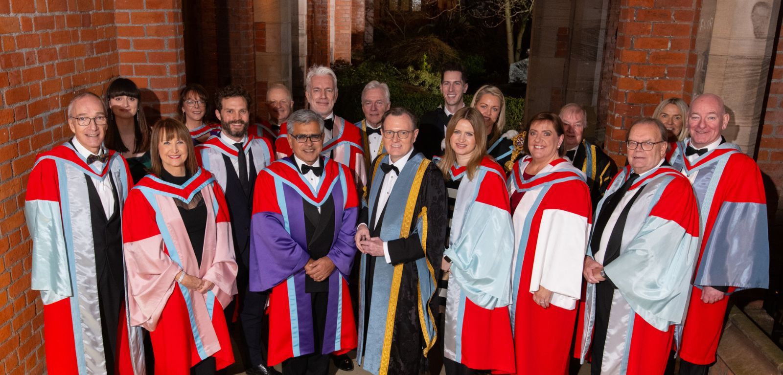 AWARD: Former Lord Mayor Tom Hartley (second from right) with other honourees including actor Jamie Dornan and former SDLP leader Mark Durkan at Queen\'s University on Monday