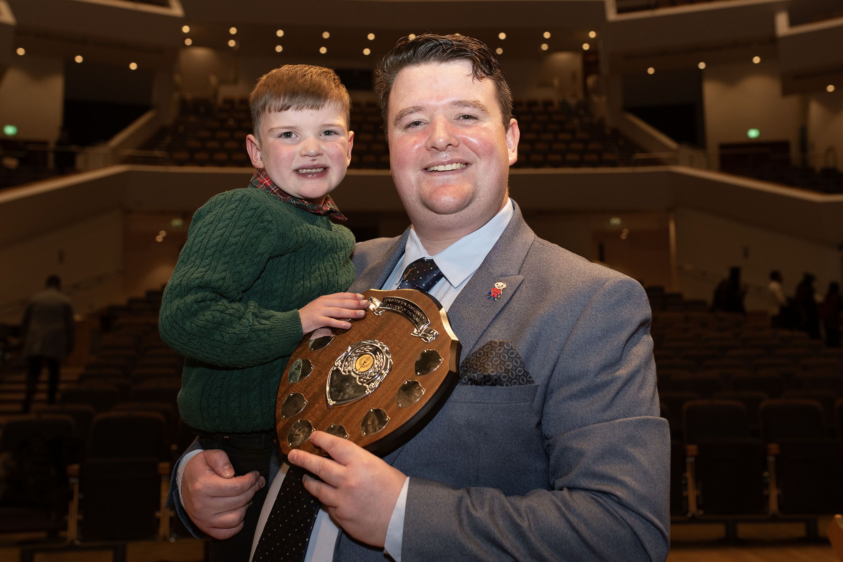 HONOURED: Máirtín Mac Gabhann and son Daithi on Monday