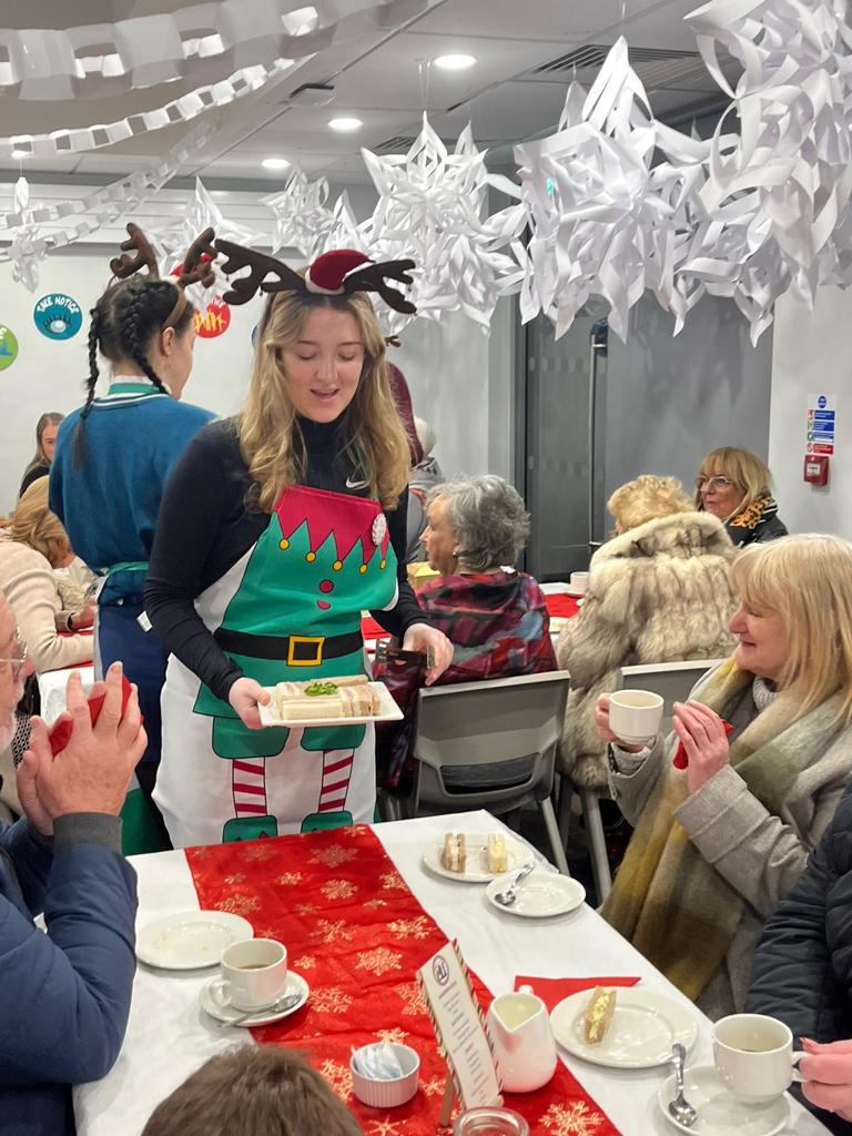 Sophie Fryers serving guests at the show