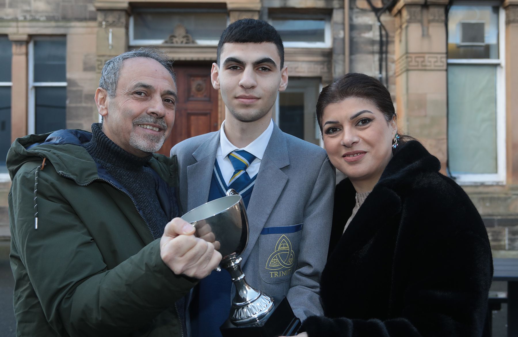 Hany Maleb (Top Achiever at GCSE 2023) with parents Raja and Alisar 