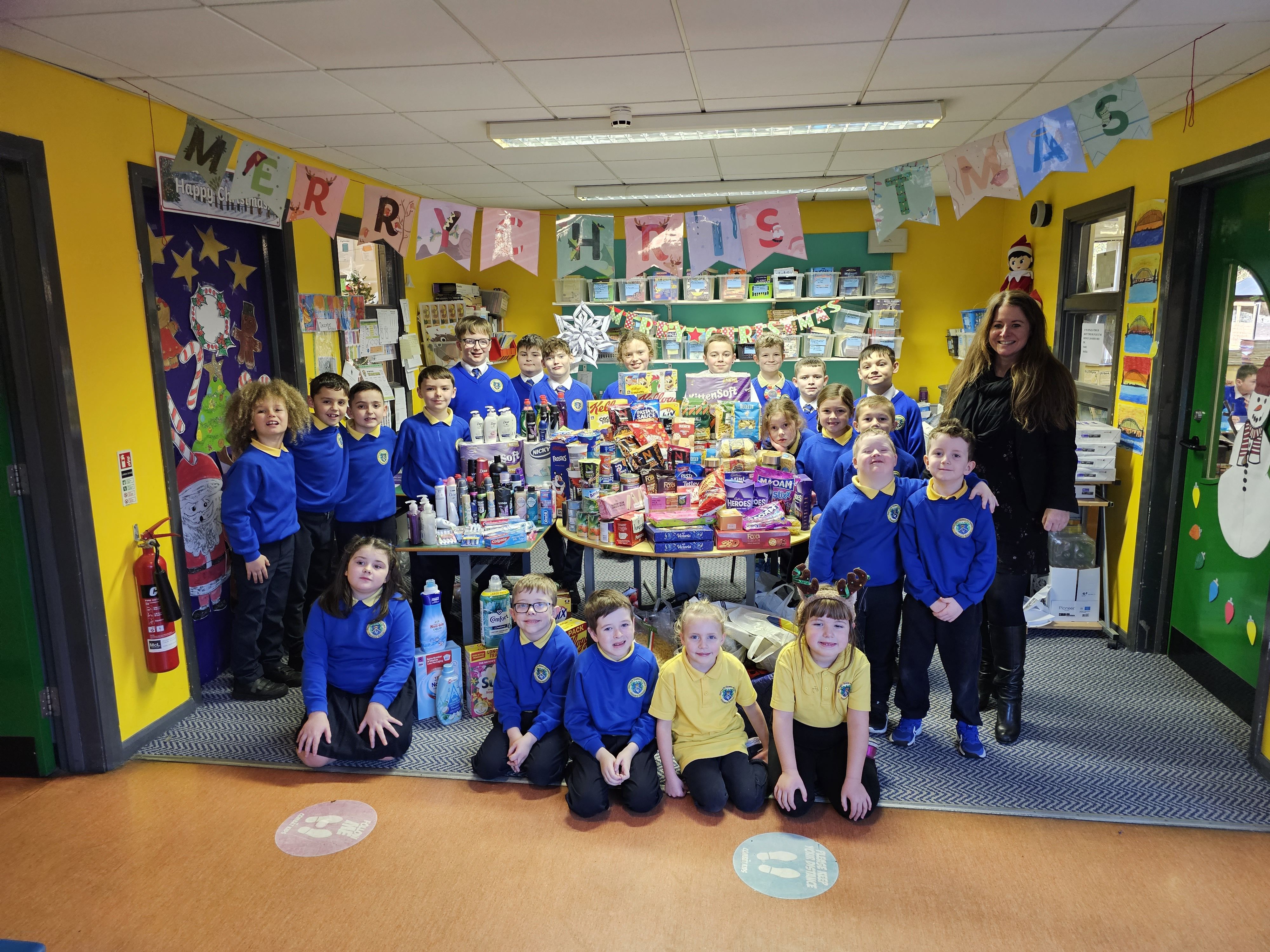 CHRISTMAS APPEAL: Our Lady Queen of Peace Primary School Principal Nicola Dougan and pupils