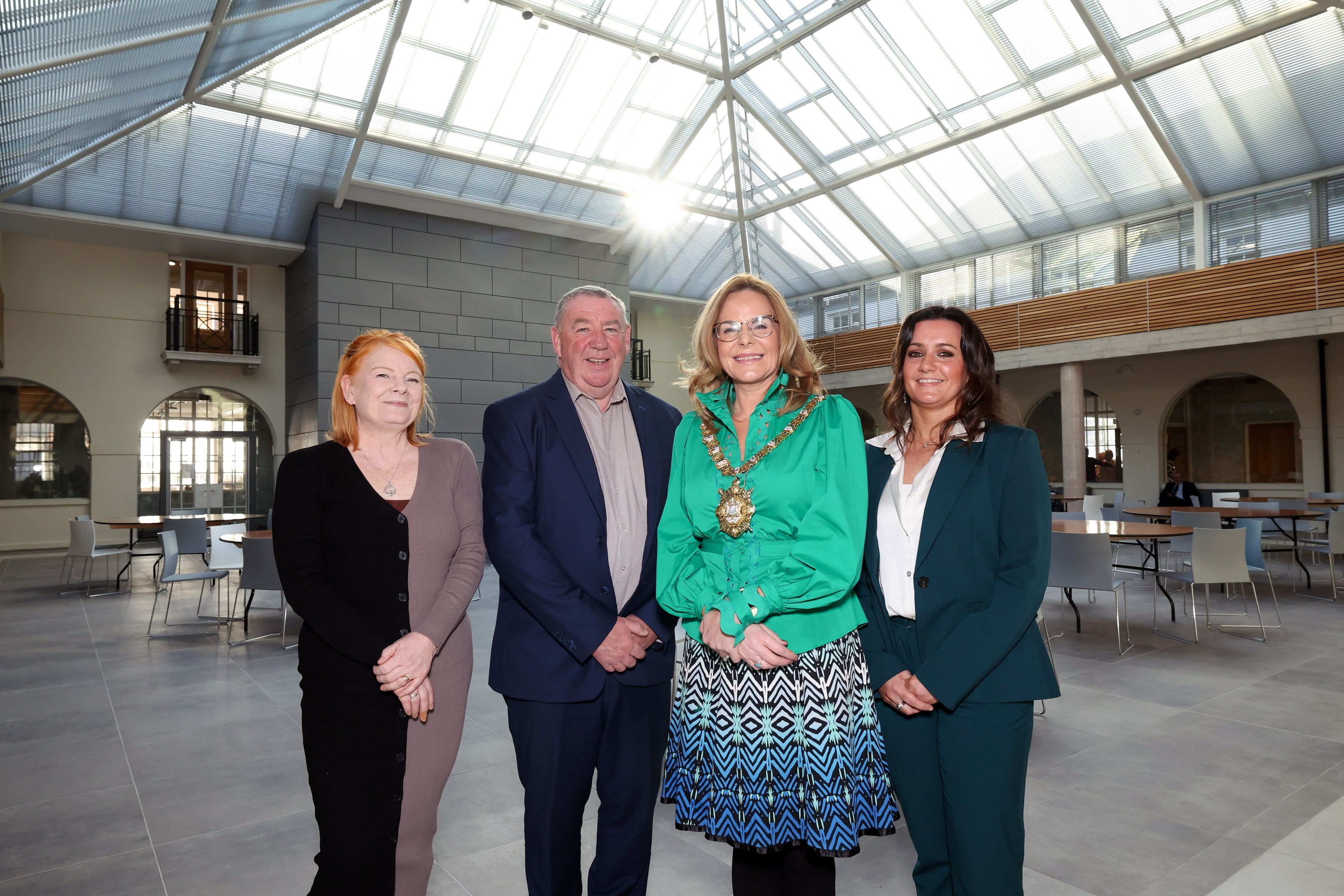 VISIT: Marie Maguire and Gerry McConville from Falls Community Council welcomed Belfast Lord Mayor Councillor Christina Black and Orla McStravick from The Executive Office’s Social Investment Fund