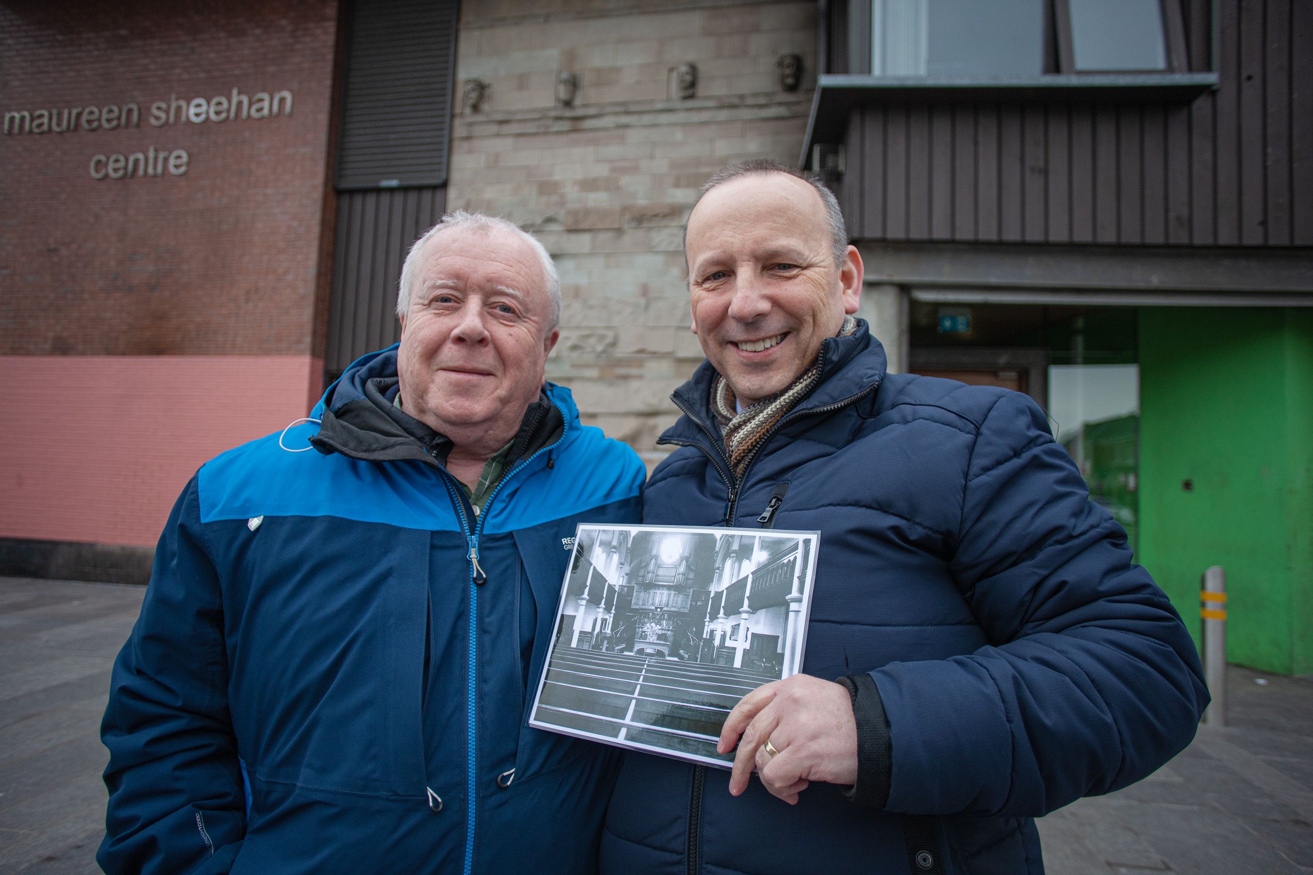 SITE: Robert McClenaghan of Falls Residents\' Association with Rev. David Moore of West Kirk Presbyterian Church at the site of the former Albert Street Church 