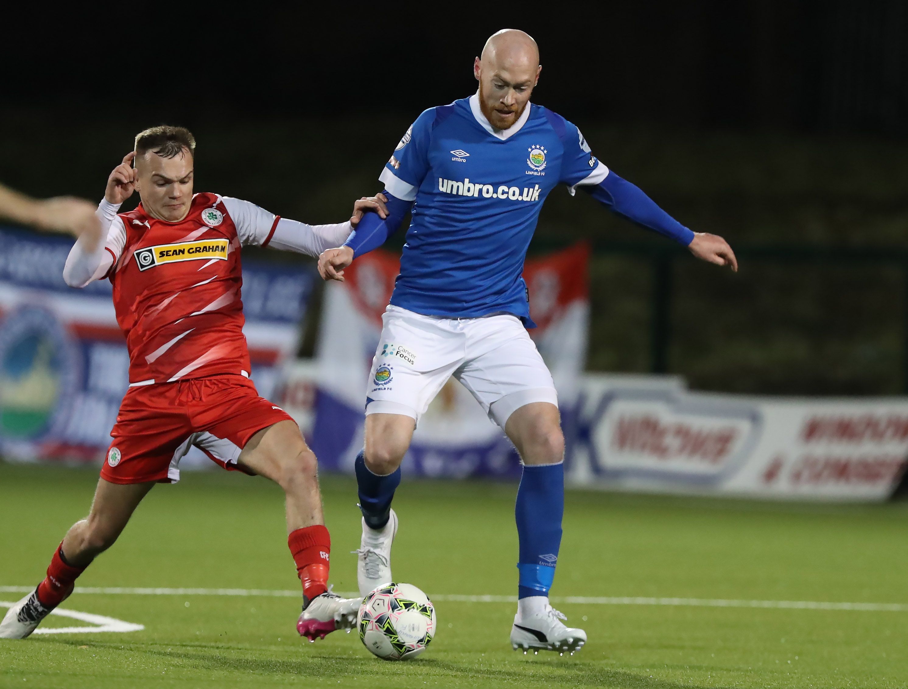 Rory Hale - pictured challenging Chris Shields during Cliftonville’s win over Linfield last month - is likely to miss Saturday’s trip to Windsor Park through injury