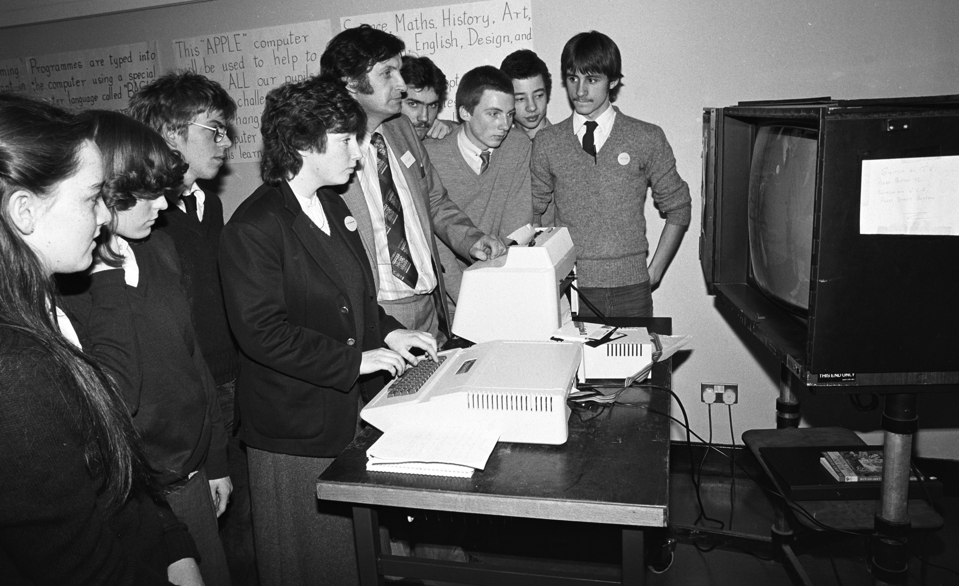 HI-TECH: Mr Tumelty demonstrates an Apple computer to pupils at St Colm\'s Secondary School, Twinbrook