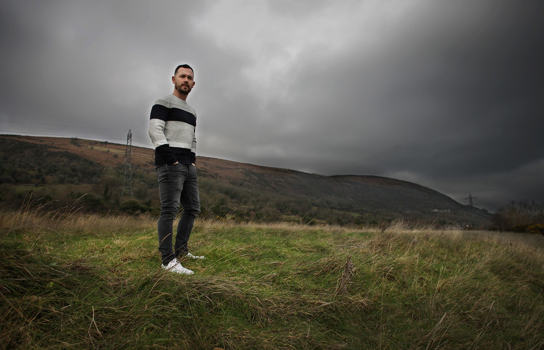 CLEAR VIEW: Sinn Féin Councillor Michael Donnelly at the site of the proposed housing development 